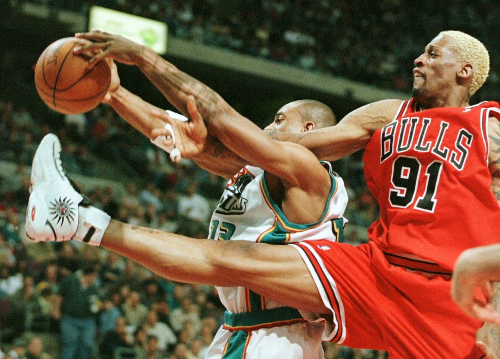 Dennis Rodman of the Chicago Bulls grabs a rebound in Game One of the  News Photo - Getty Images