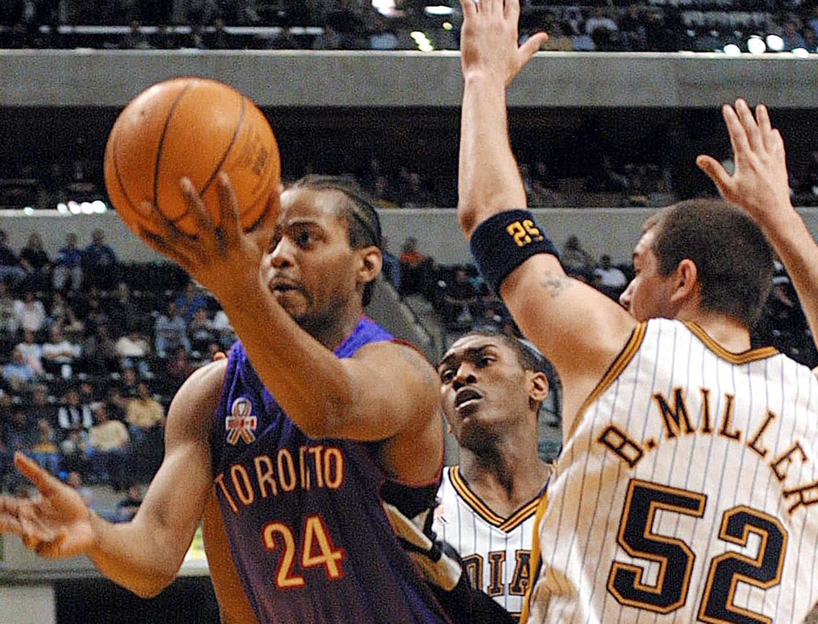 Toronto Raptors' Anthony Parker (R) high-fives teammate Morris