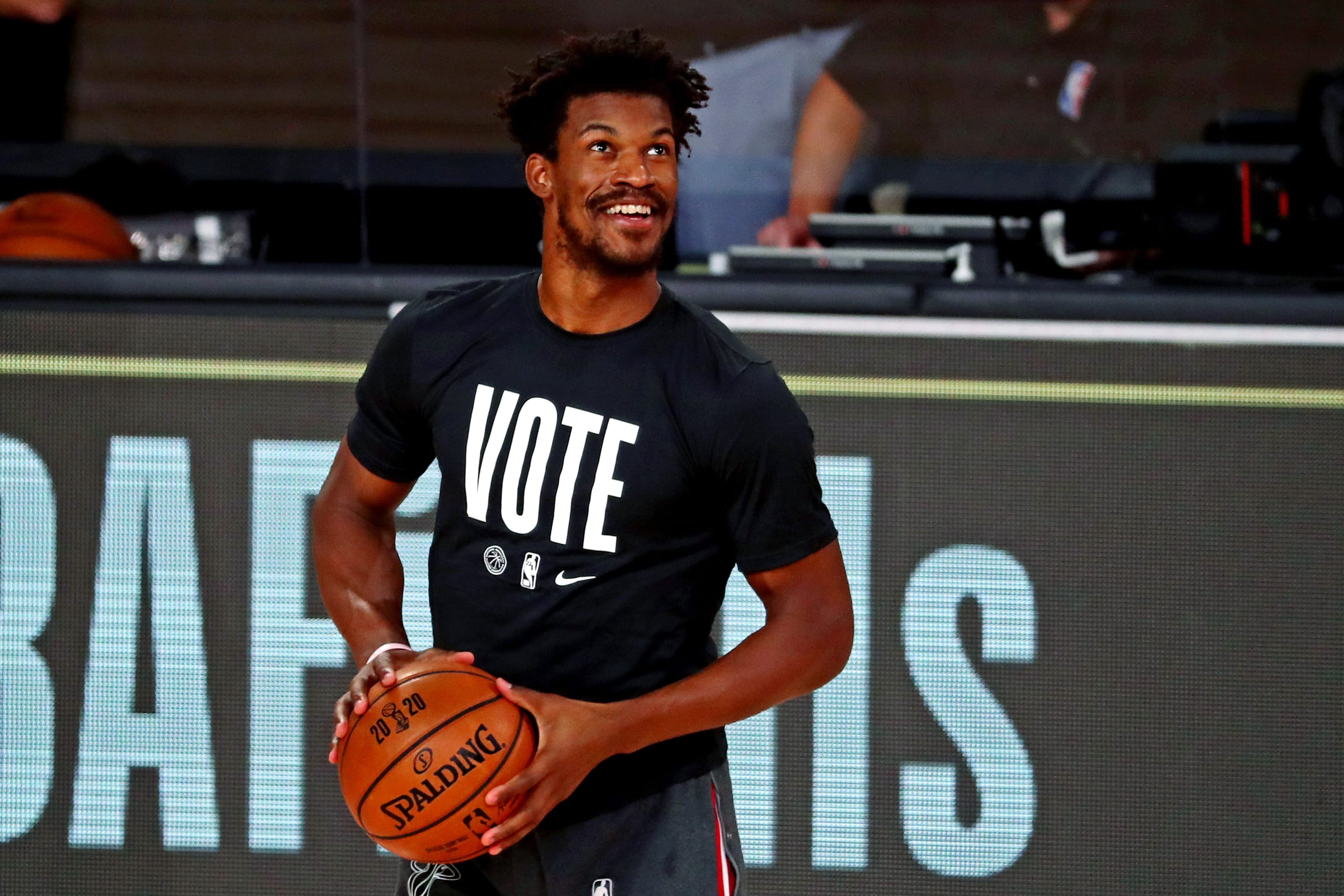 Jimmy Butler of the Miami Heat wears a VOTE shirt and warms up prior  News Photo - Getty Images