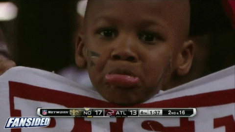 Saints at Falcons: Little Falcons fan is very sad with his 'Rise Up' towel  still in hand (GIF)