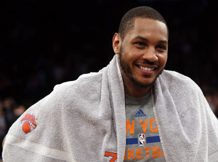 Denver Nuggets forward Carmelo Anthony smiles during warm ups