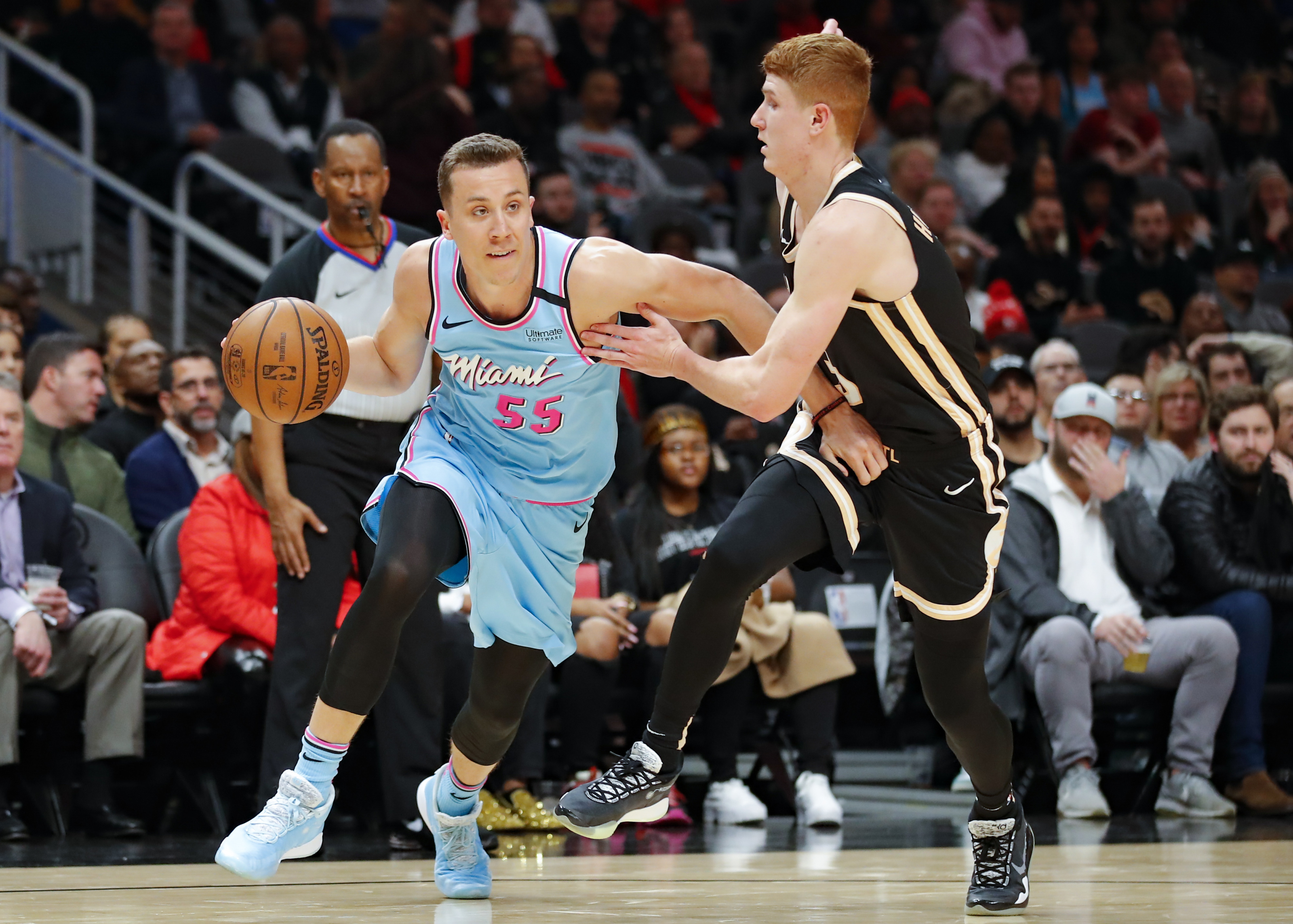 Duncan Robinson of the Miami Heat drives to the basket during Game