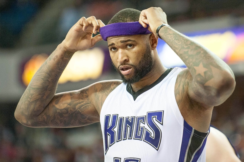 Sacramento Kings center DeMarcus Cousins puts on his headband before the  start of the second half of an NBA basketball game against the Chicago  Bull, Wednesday, Feb. 3, 2016, in Sacramento, Calif.