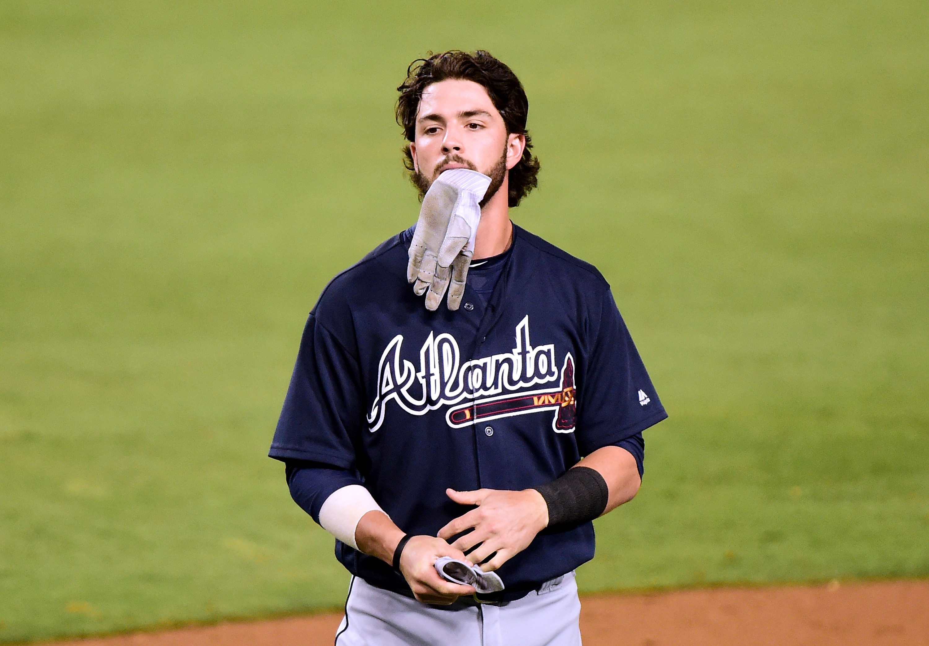 Dansby Swanson of the Atlanta Braves looks on against the