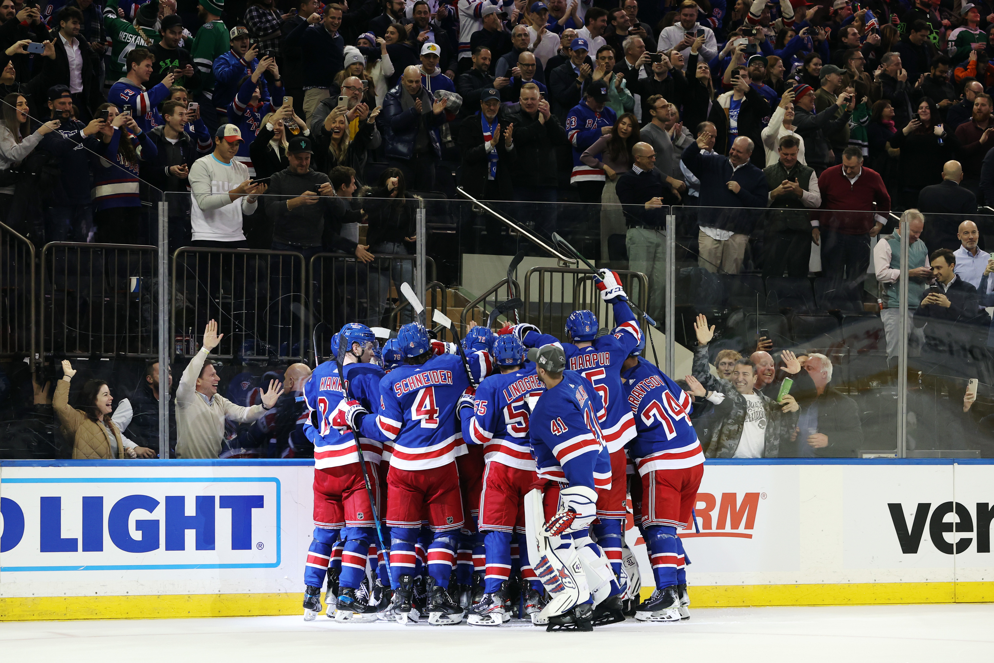The New York Rangers celebrate their victory over the Minnesota