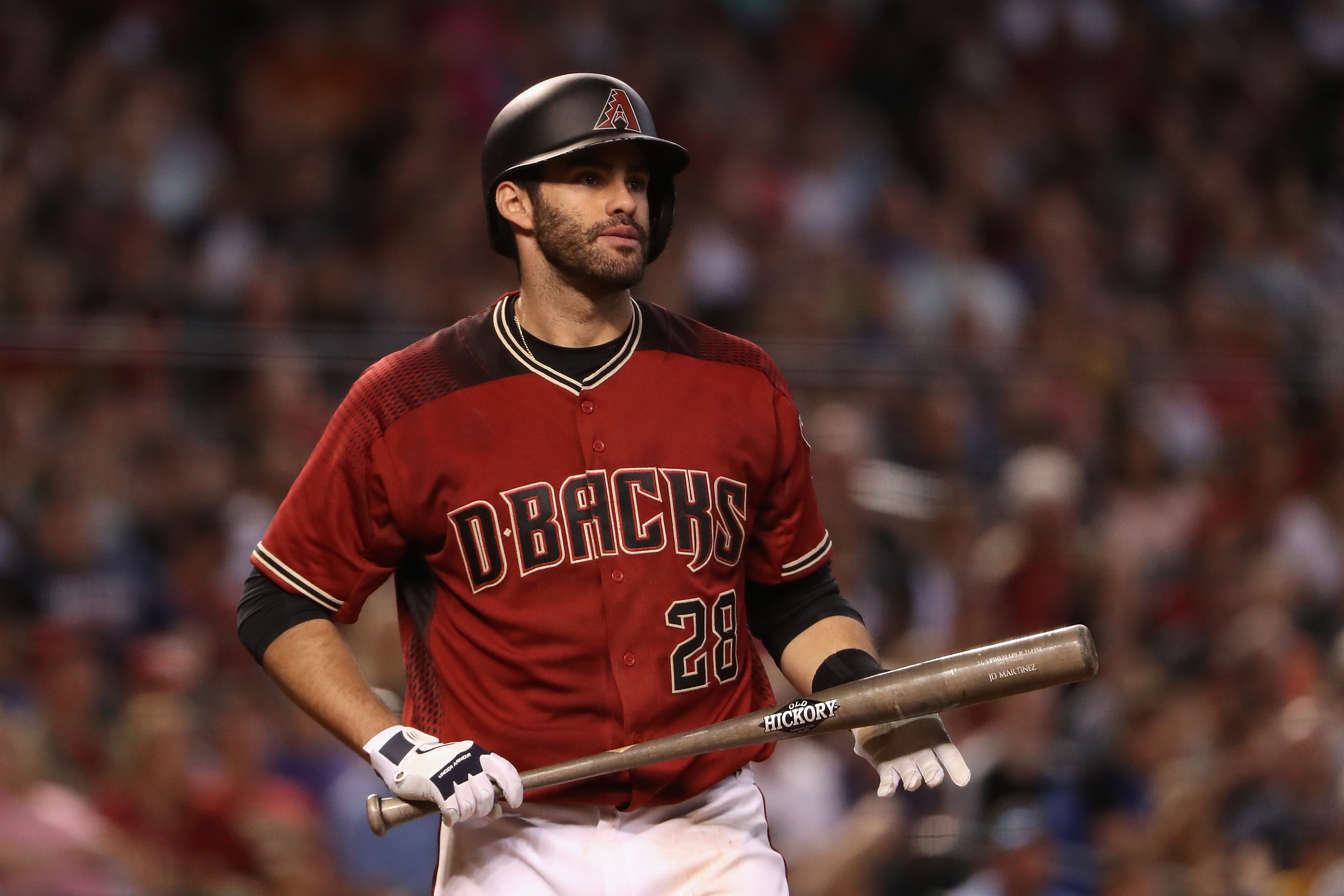 J.D. Martinez, surprised to still be with the team, sorts through