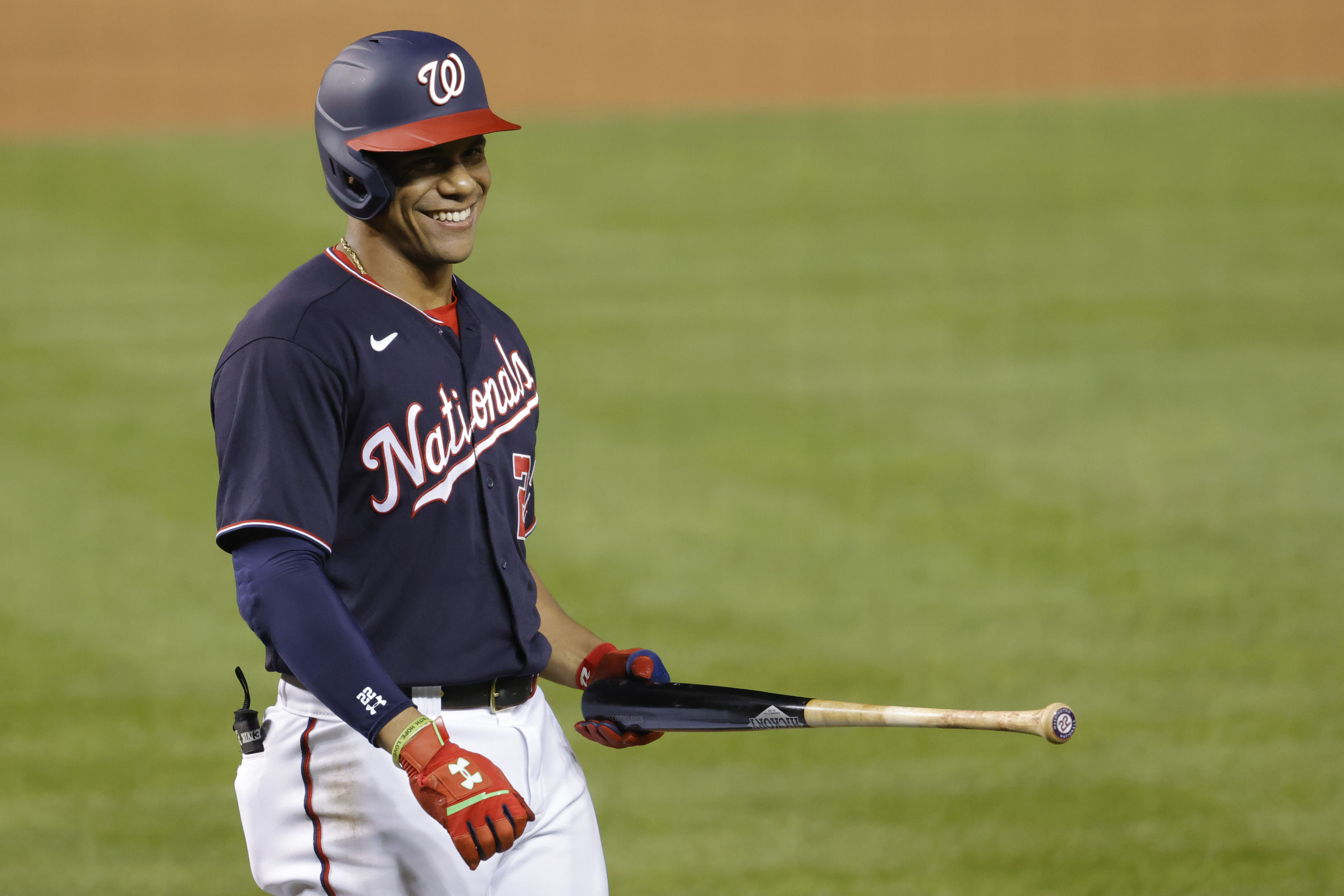 Washington Nationals center fielder Juan Soto (22) smiles in the