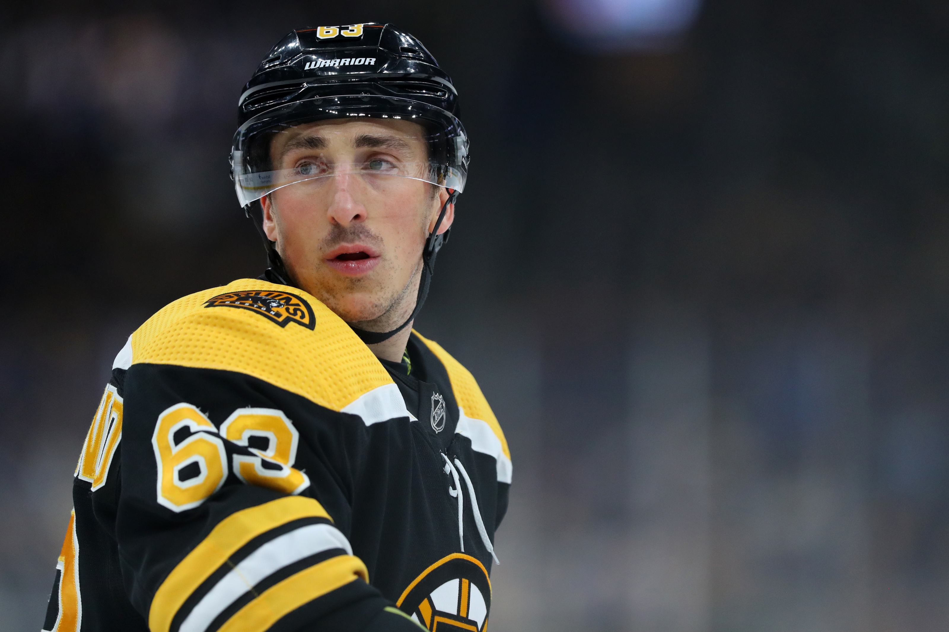Bruins' Brad Marchand licks opponent's face