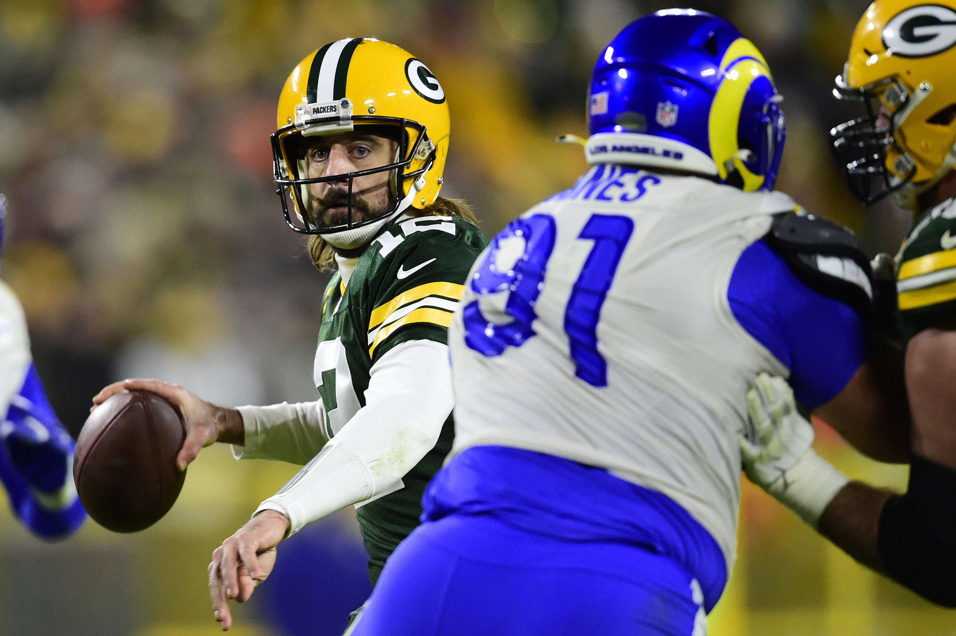 Packers keep their slim playoff hopes alive after defeating the