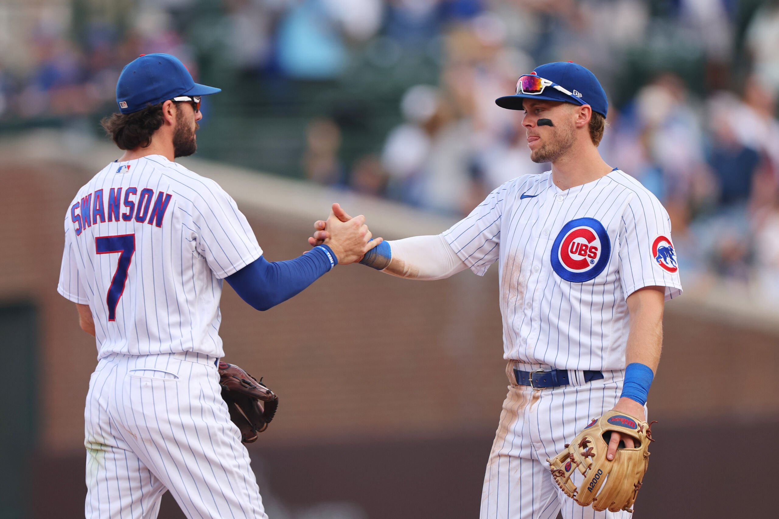 Dansby Swanson and Nico Hoerner of the Chicago Cubs celebrate