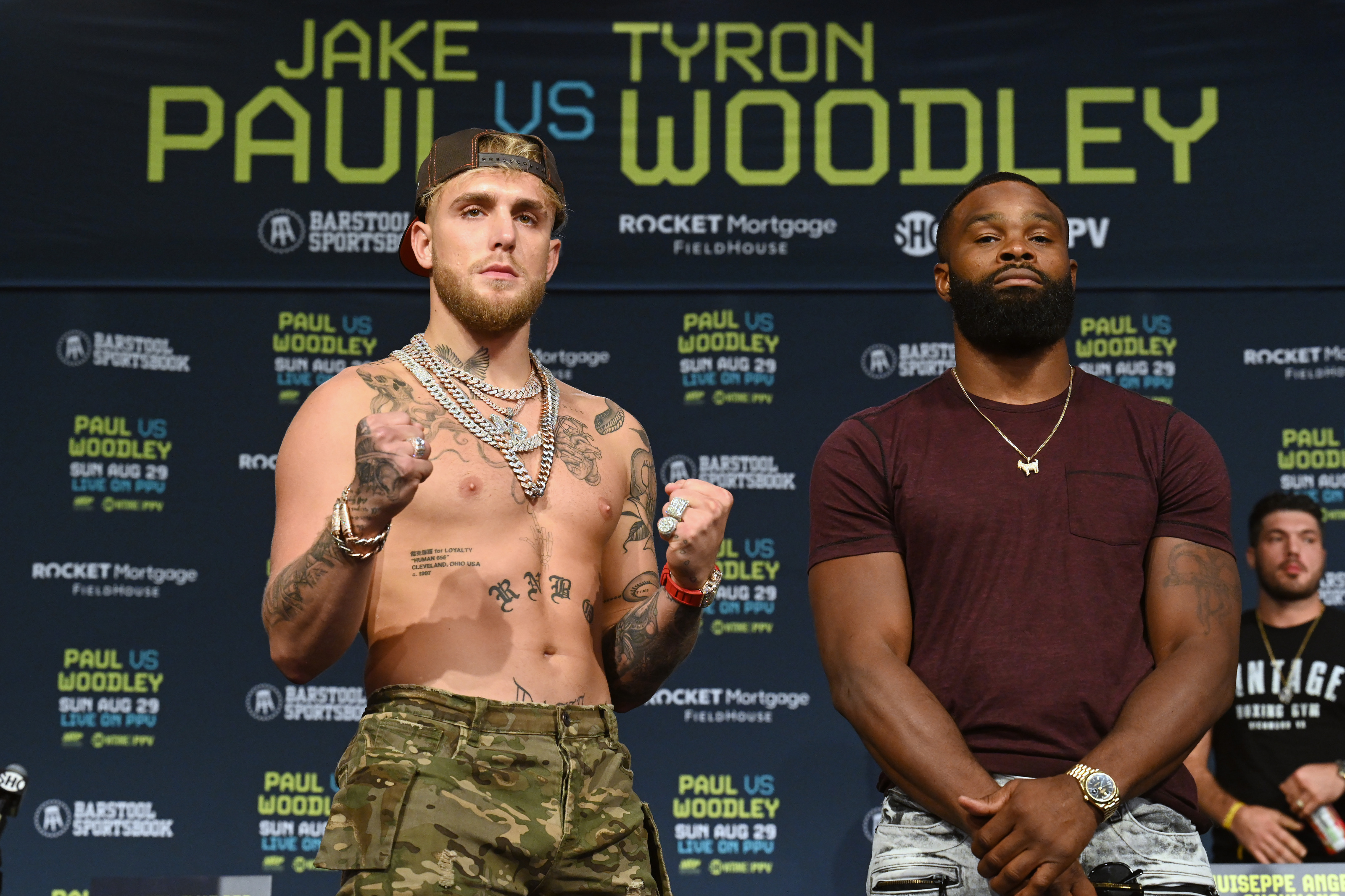 Jake Paul gets gotcha hat tattoo in taunt to Floyd Mayweather after mass  brawl breaks out at brother Logans face off  The US Sun