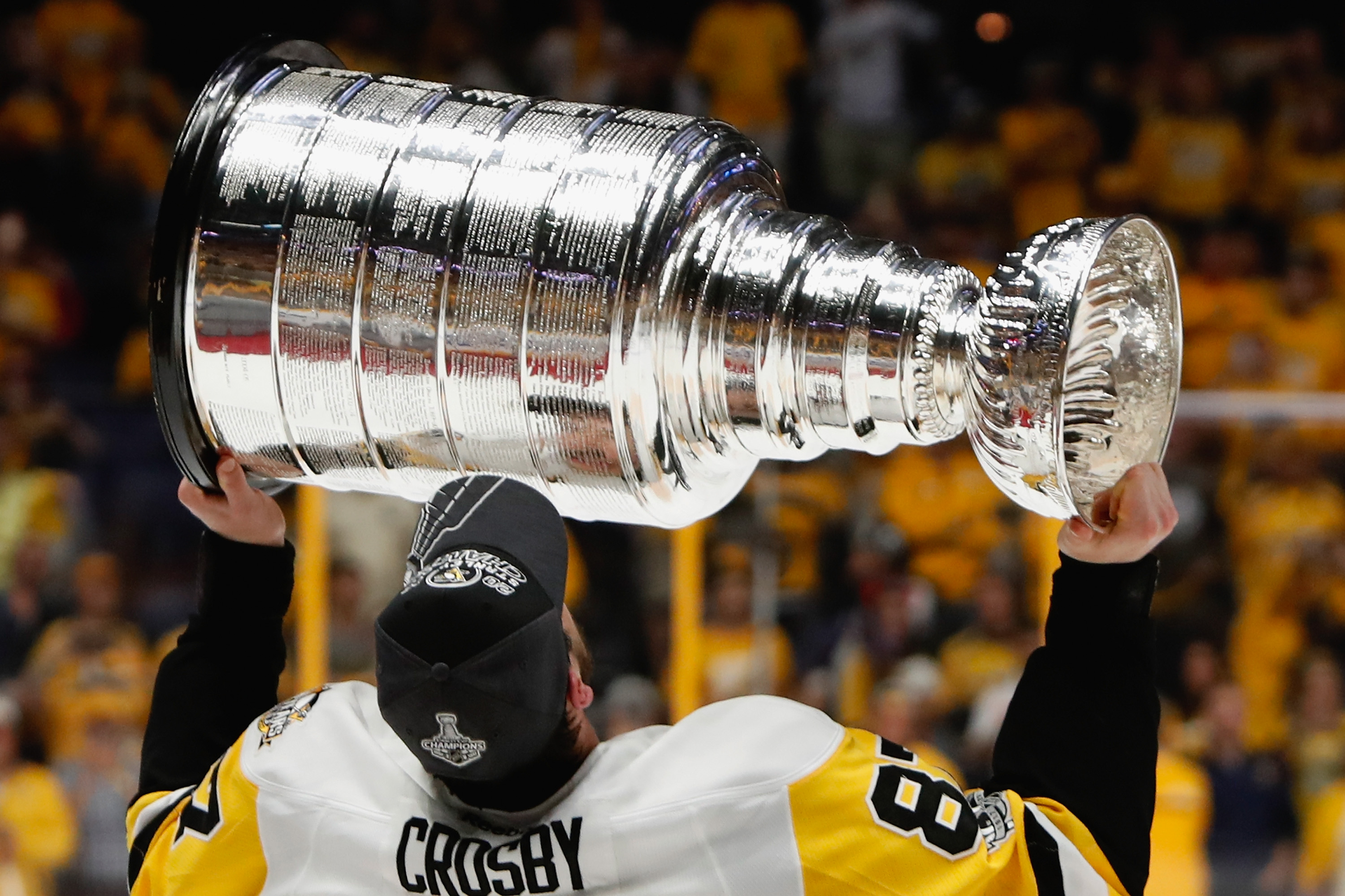 Sidney Crosby of the Pittsburgh Penguins holds the Stanley Cup News  Photo - Getty Images