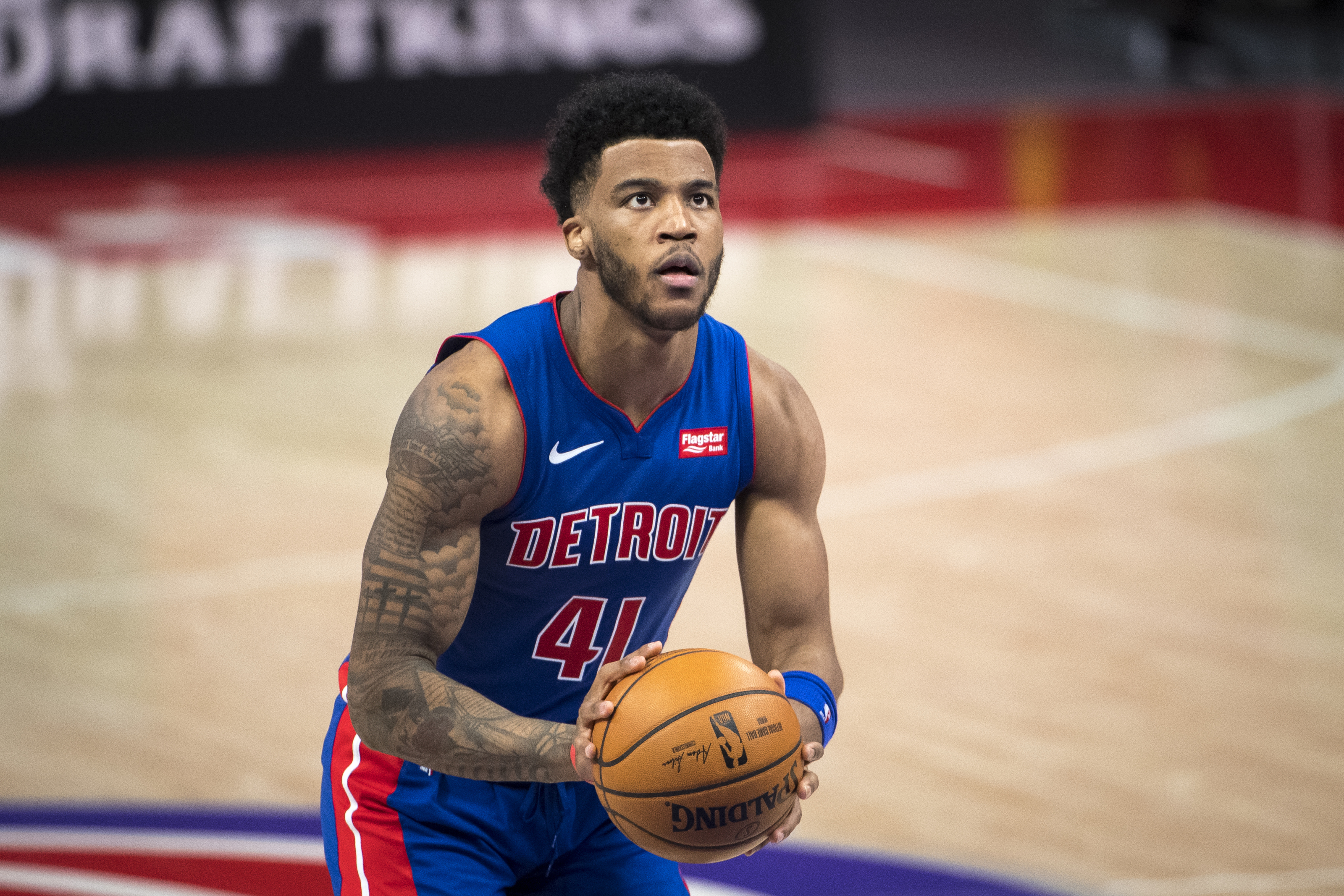 Saddiq Bey of the Detroit Pistons dribbles the ball against the