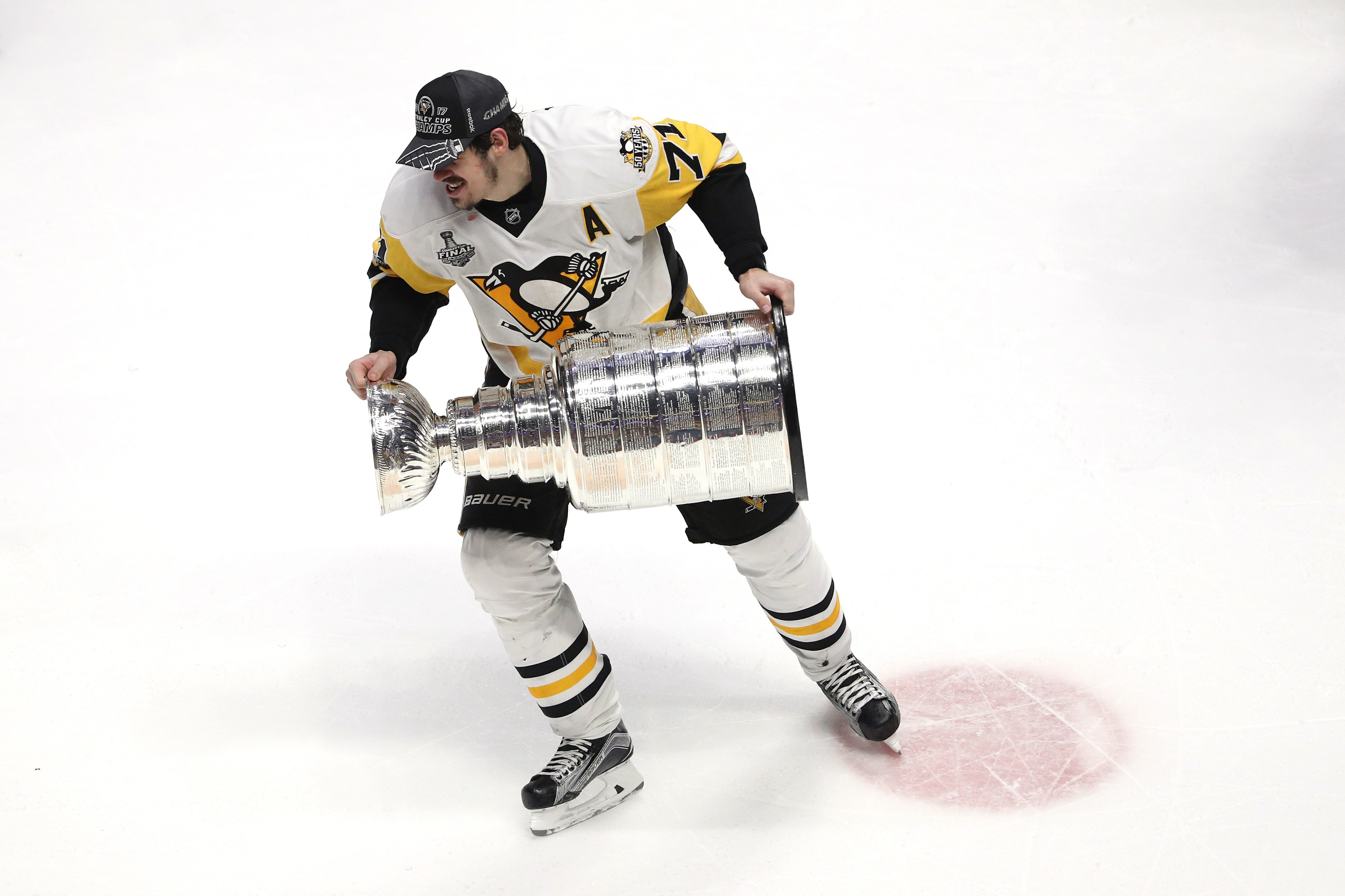 Evgeni Malkin drops the gloves while the Penguins drop the NHL's