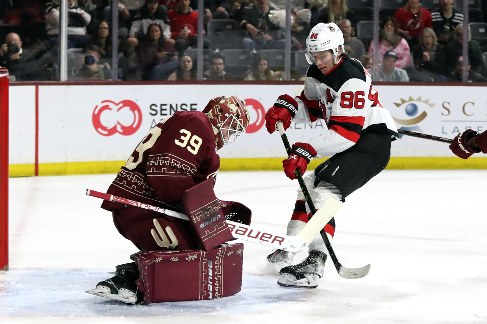 Coyotes fight back before falling to Devils in overtime