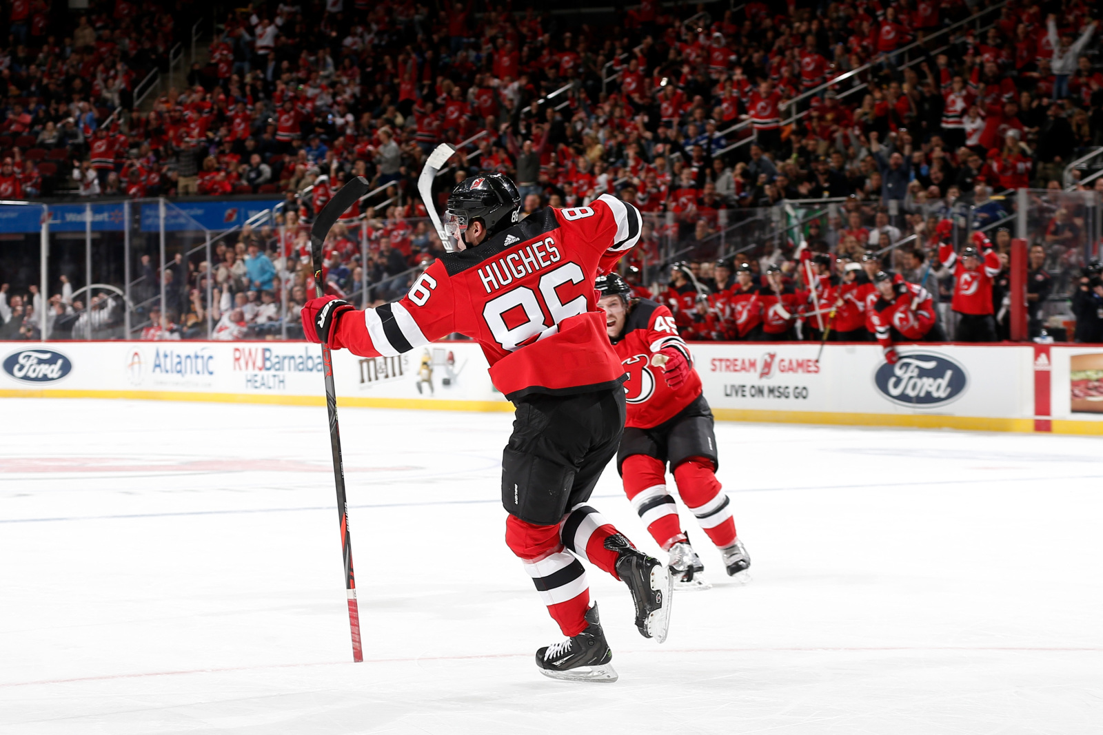 Devils' Jack Hughes scores 1st NHL goal in 1-0 win over Canucks - Sports  Illustrated
