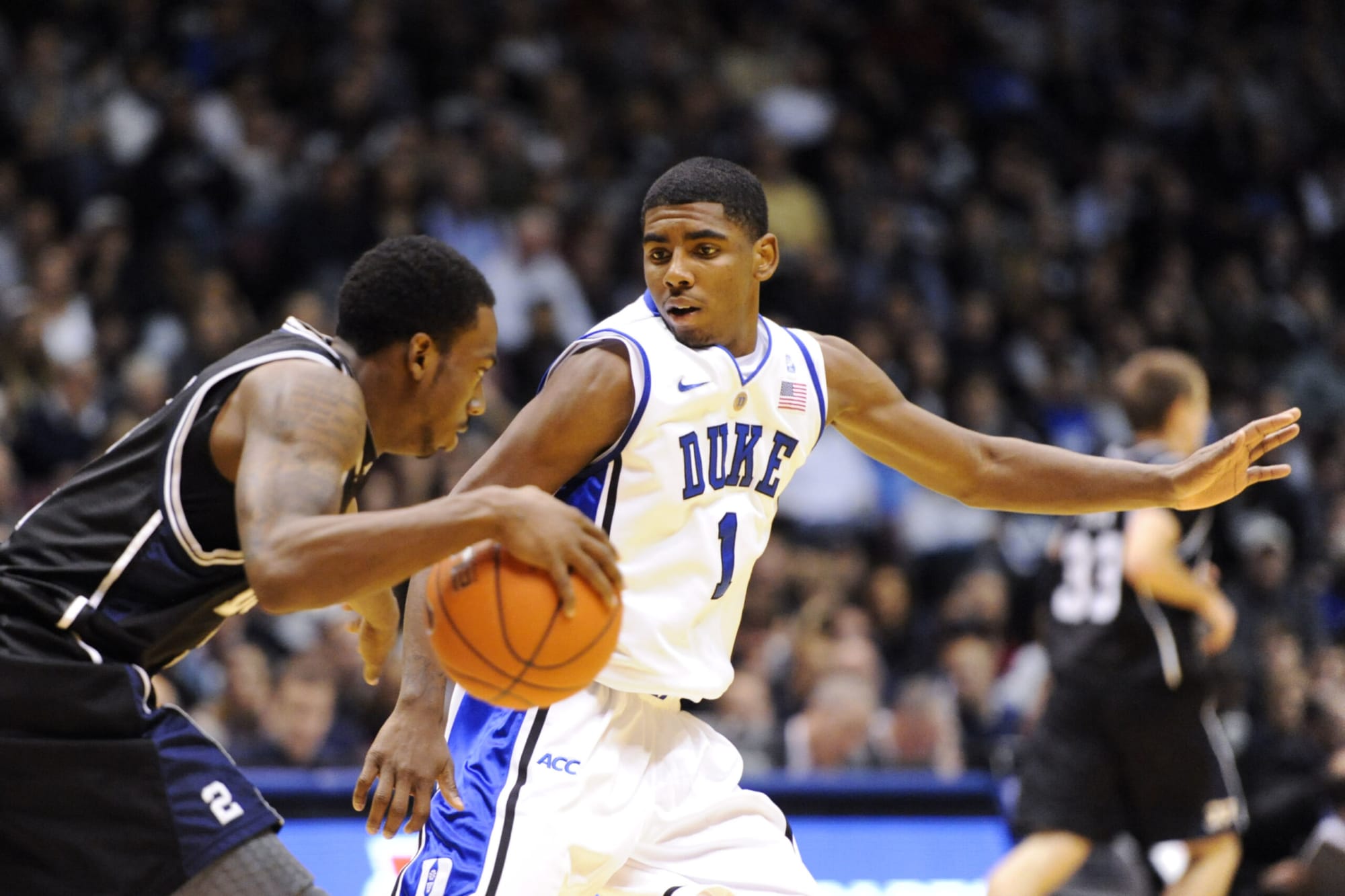 Kyrie Irving of the Duke Blue Devils looks on while taking on the