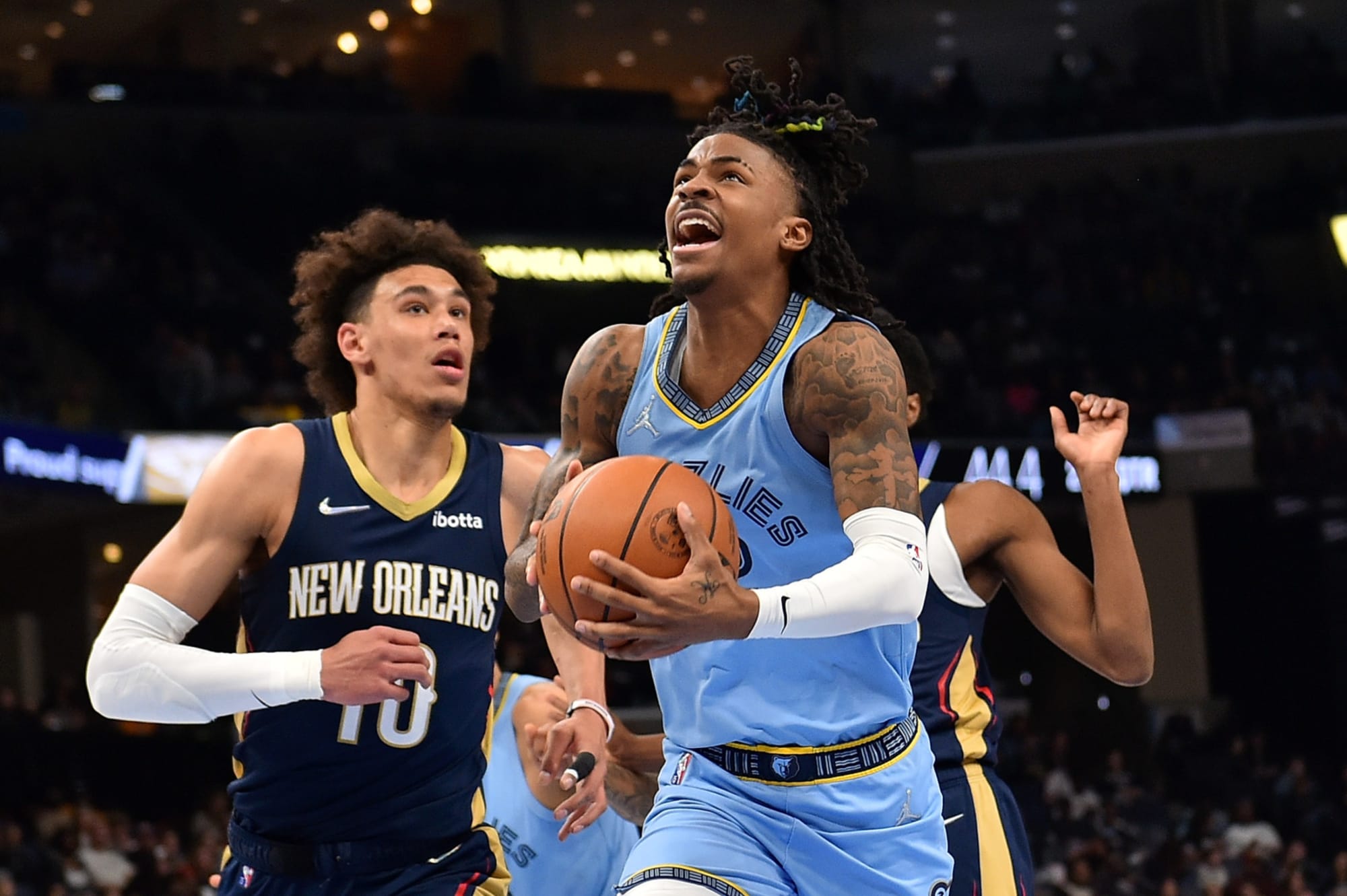 Ja Morant of the Memphis Grizzlies looks on during the game against News  Photo - Getty Images
