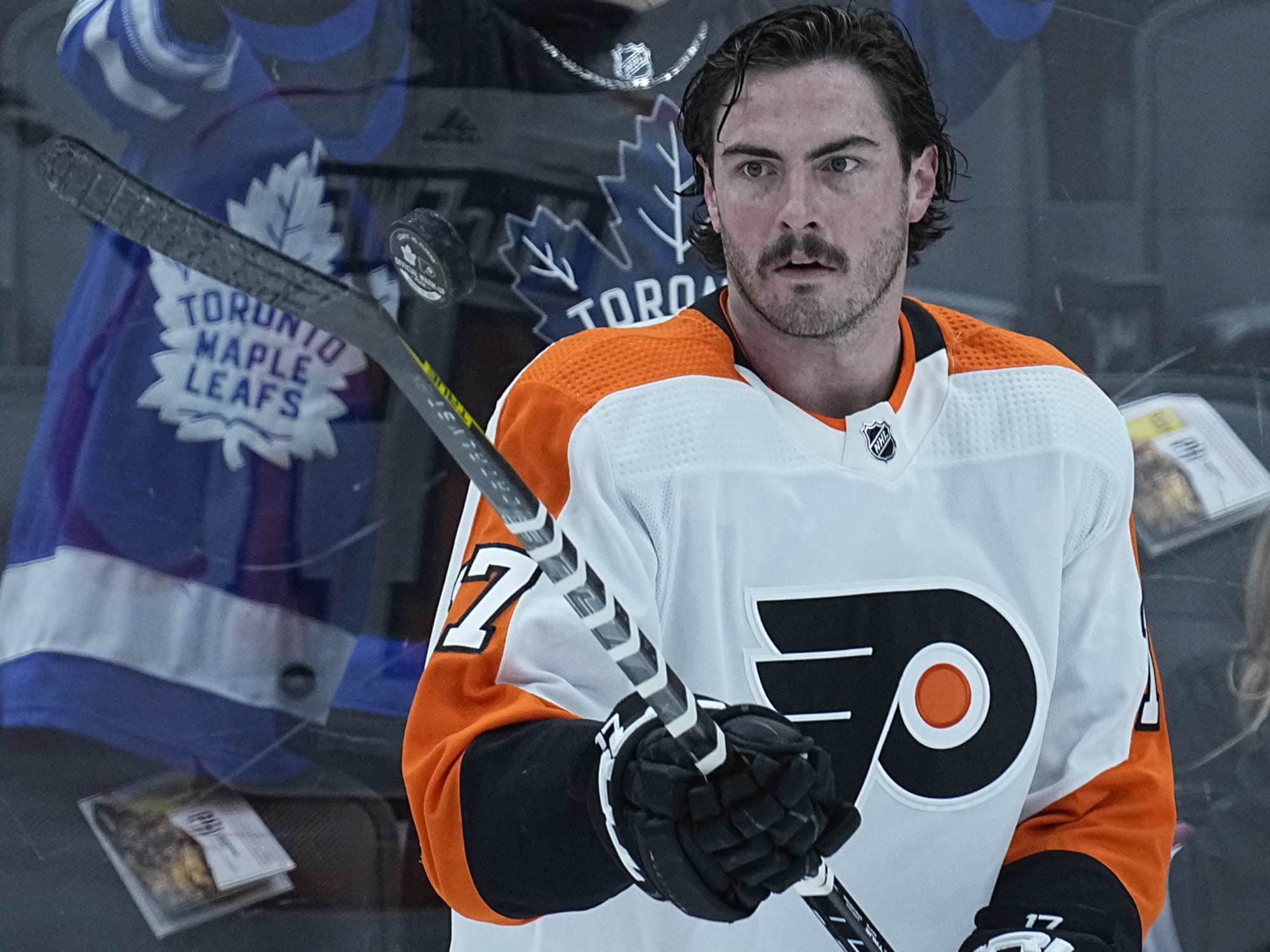 Former Flyers forward Zack MacEwen signs a three-year deal with