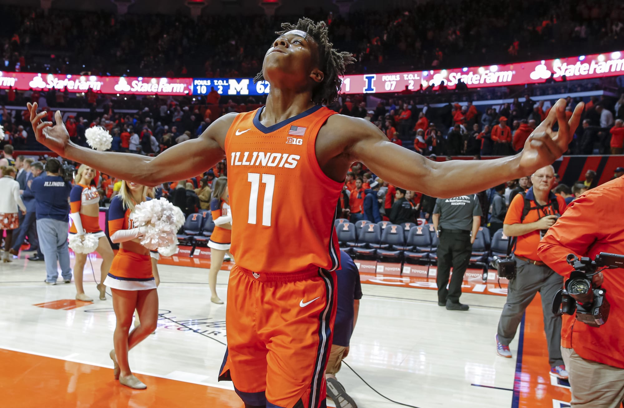 Ayo Dosunmu Illinois Fighting Illini Unsigned Dribbles the Ball in Navy  Jersey Photograph