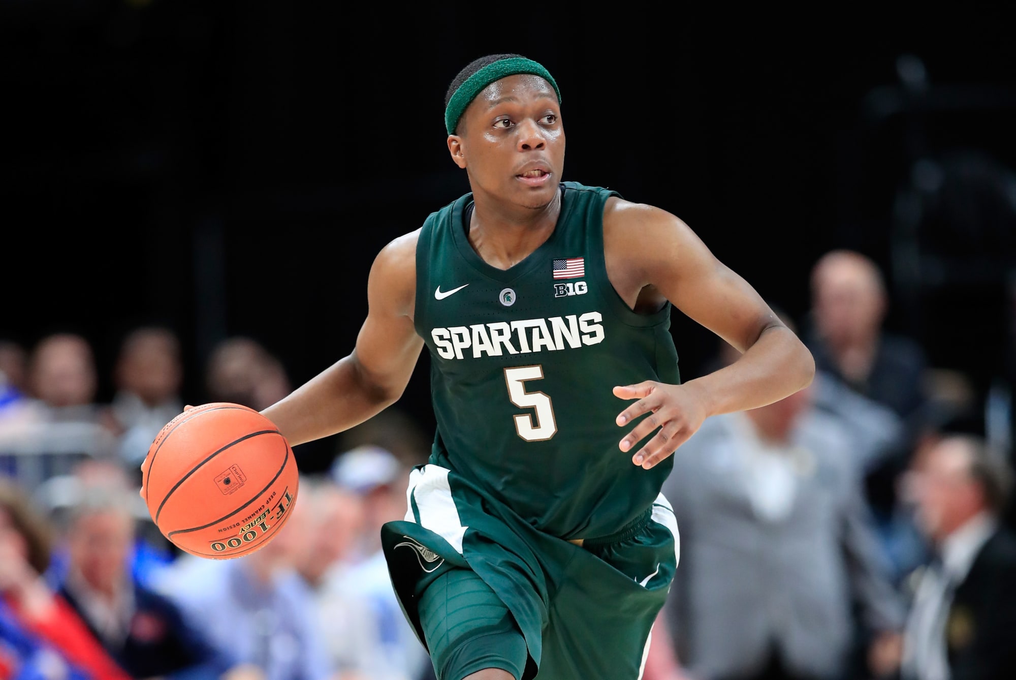 Michigan State star Cassius Winston has a city behind him