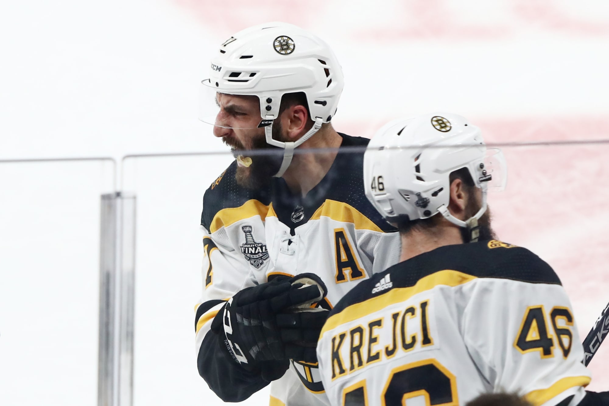 Boston Bruins bring back captain Patrice Bergeron, David Krejci