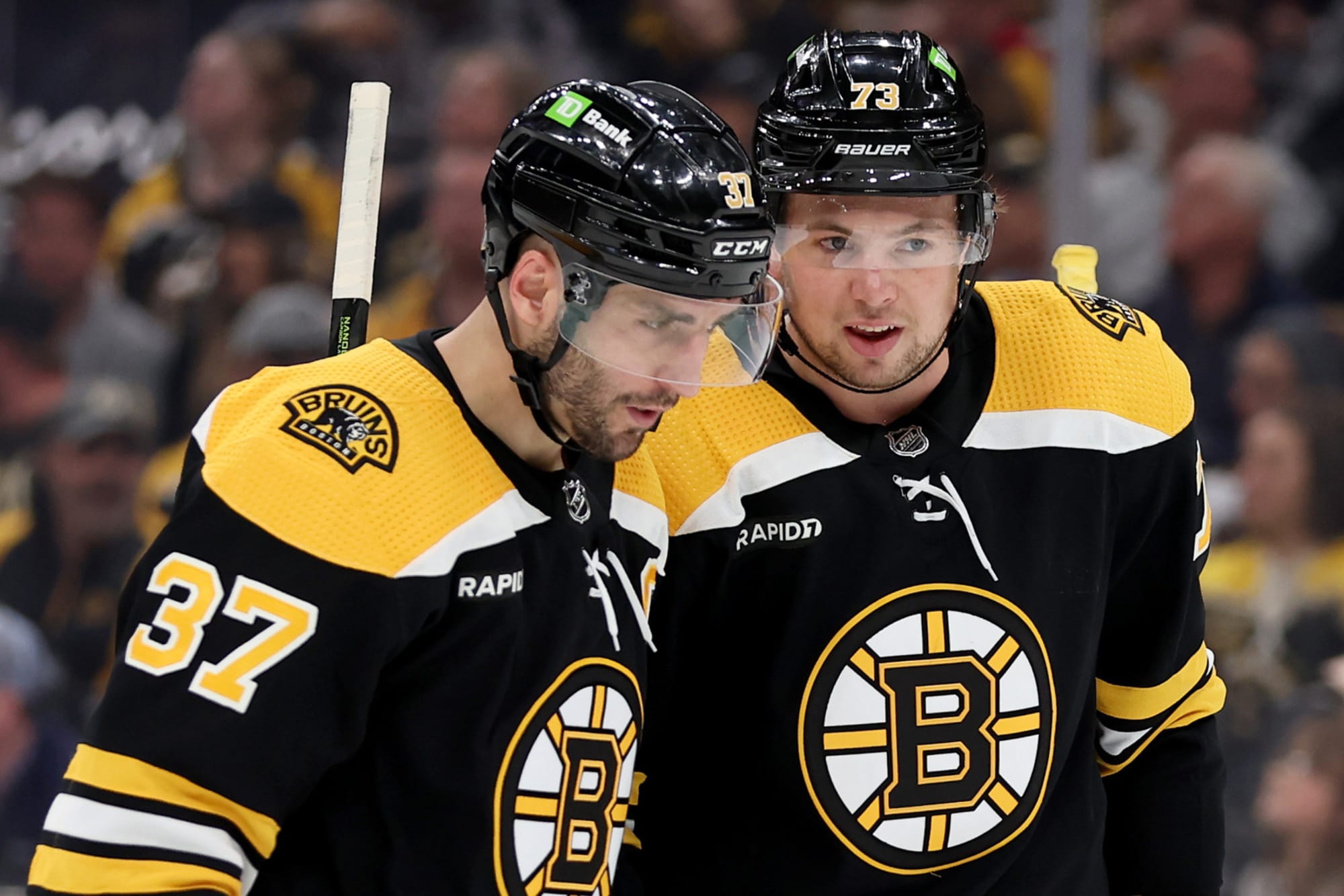 Bruins captaincy passes from Bergeron to Marchand