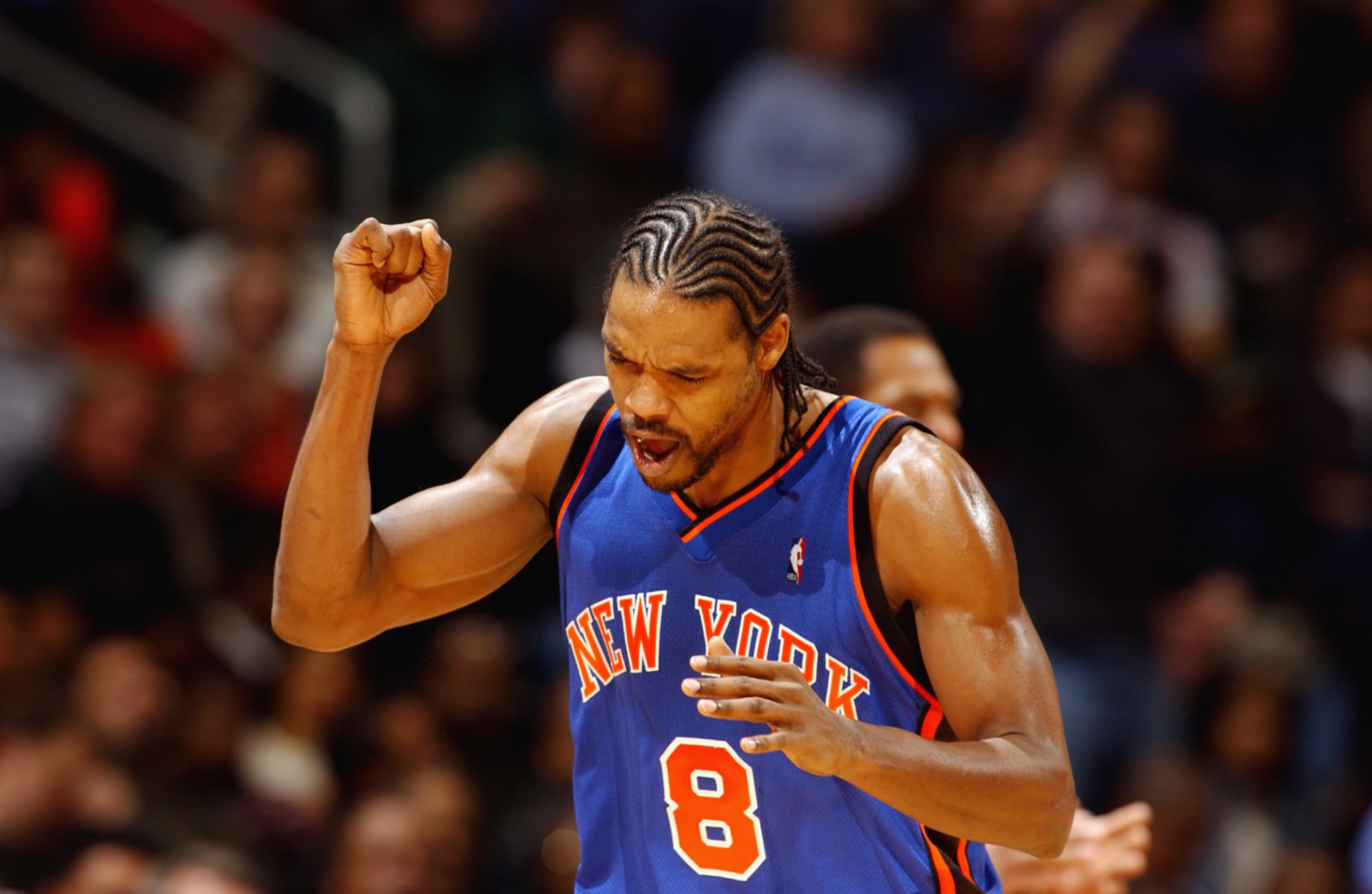 Latrell Sprewell of the New York Knicks attempts a dunk against