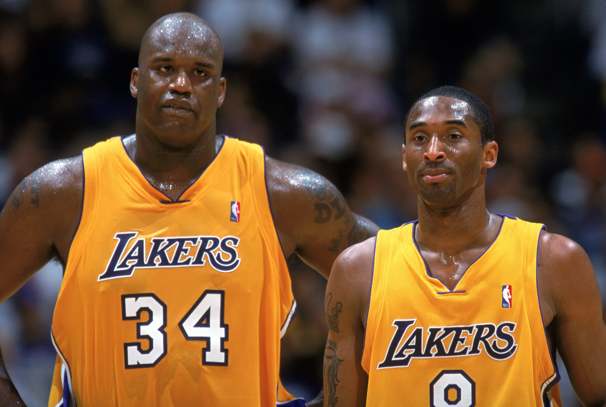 List of players with jerseys retired by the Los Angeles Lakers: Kobe  Bryant, Shaquille O'Neal, Magic