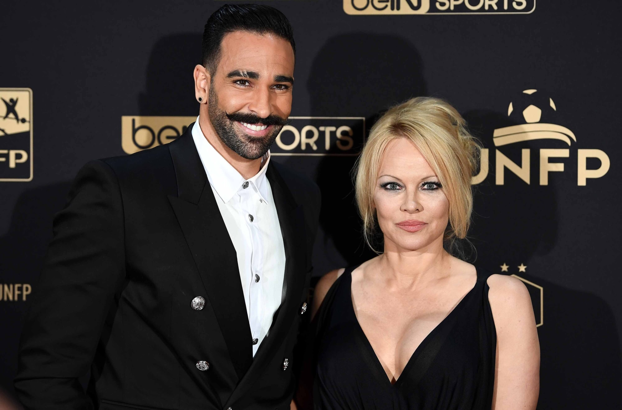 Who was the French soccer player Pamela Anderson dated?