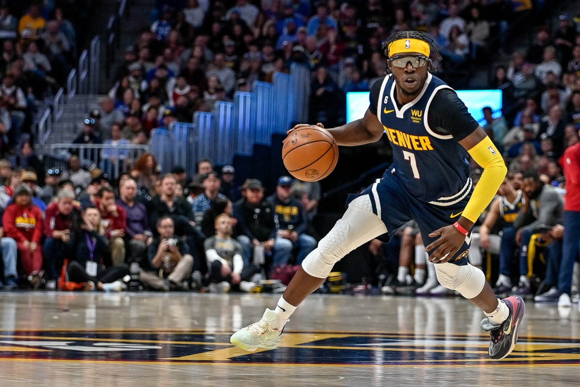 Reggie Jackson wins an NBA championship with the Denver Nuggets