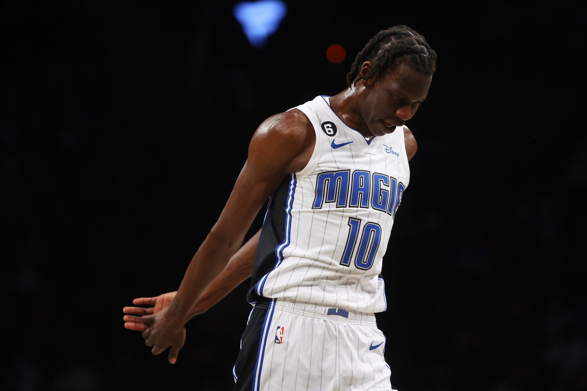 Orlando Magic's Bol Bol Continues to Follow in His Father's Footsteps by  Welcoming Refugee Children to Their First NBA Game