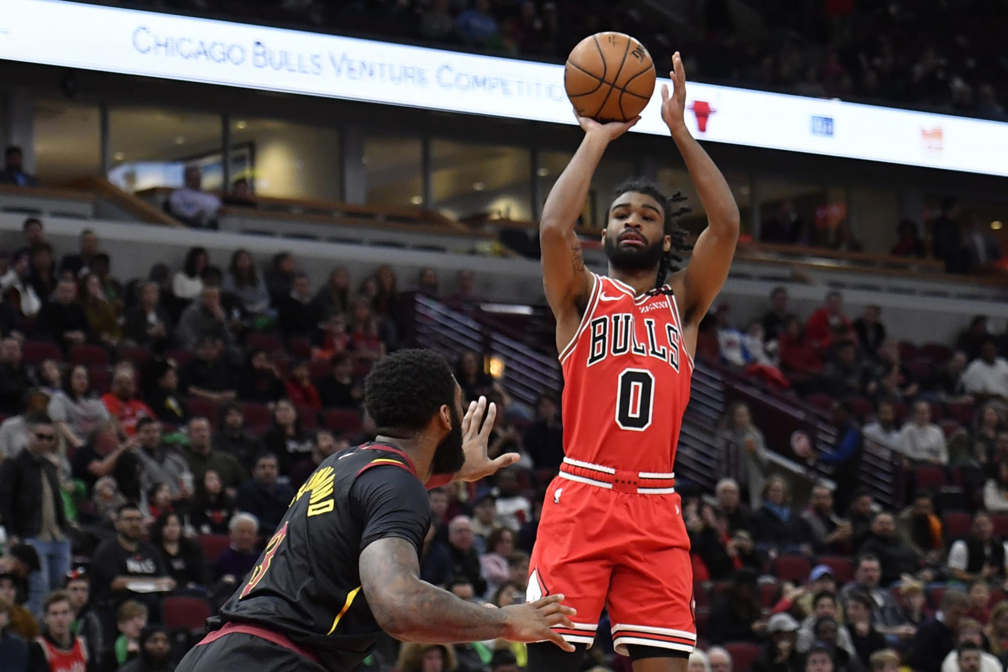 Chicago Bulls Guard Coby White shoots the ball over Utah Jazz