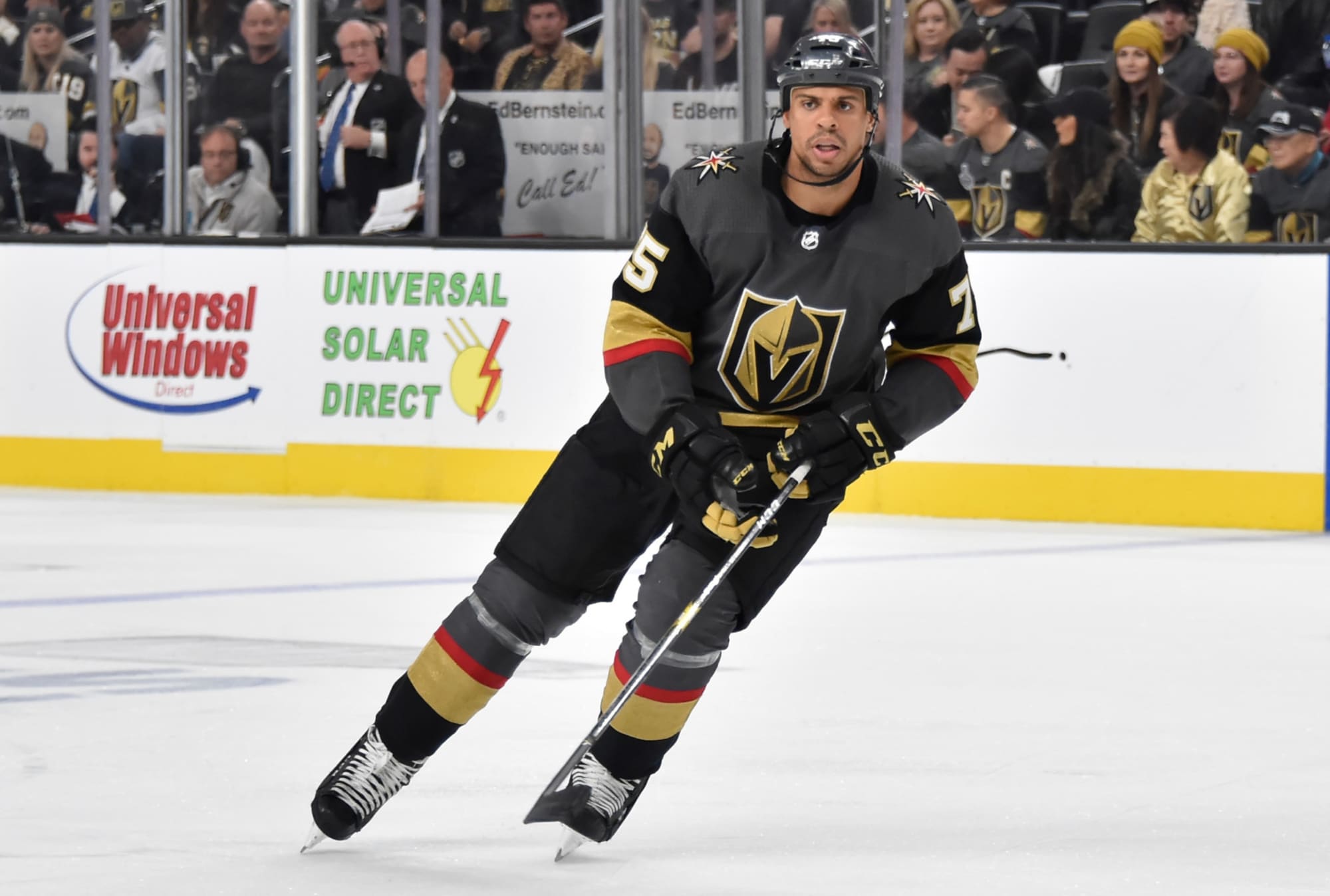 Vegas Golden Knights right wing Ryan Reaves (75) gets help with