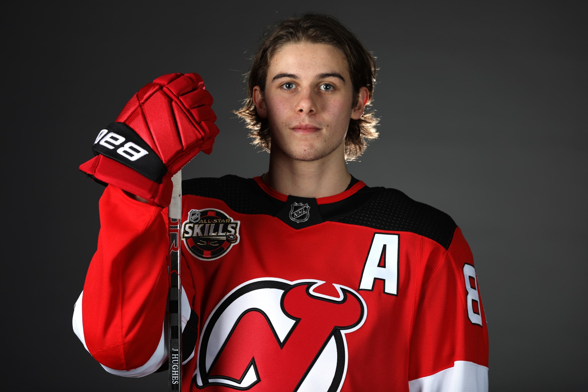 Jack Hughes of the New Jersey Devils waits for the next play against  News Photo - Getty Images