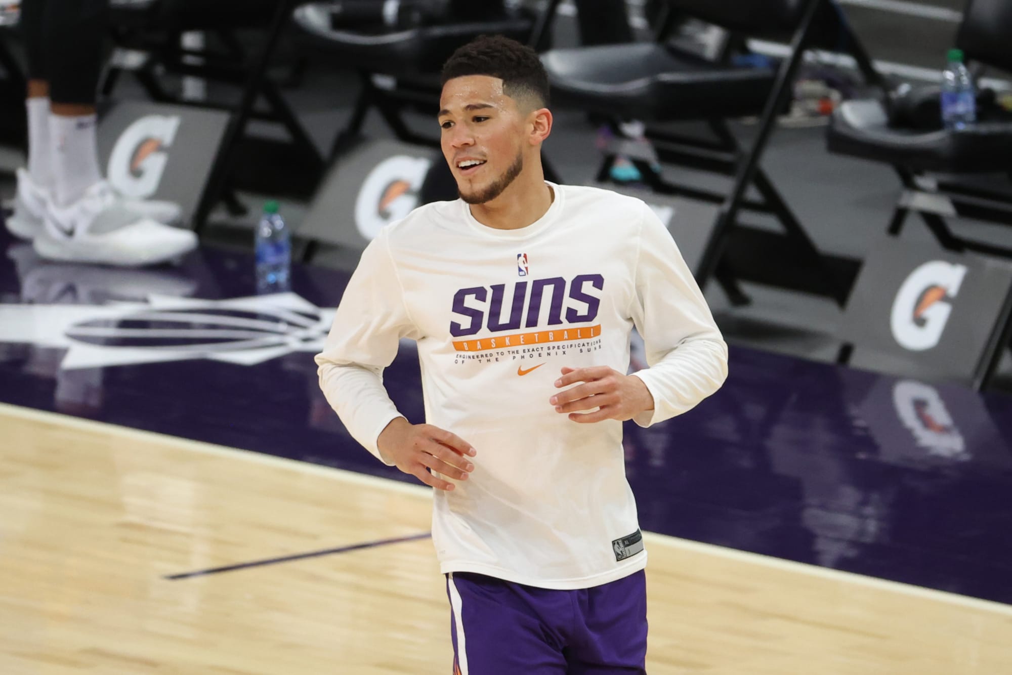 Suns' Devin Booker will miss start of camp due to health protocols