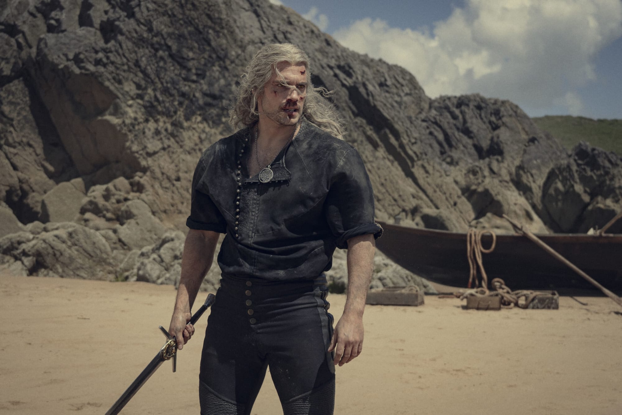 The Witcher director hints at why Henry Cavill left the show