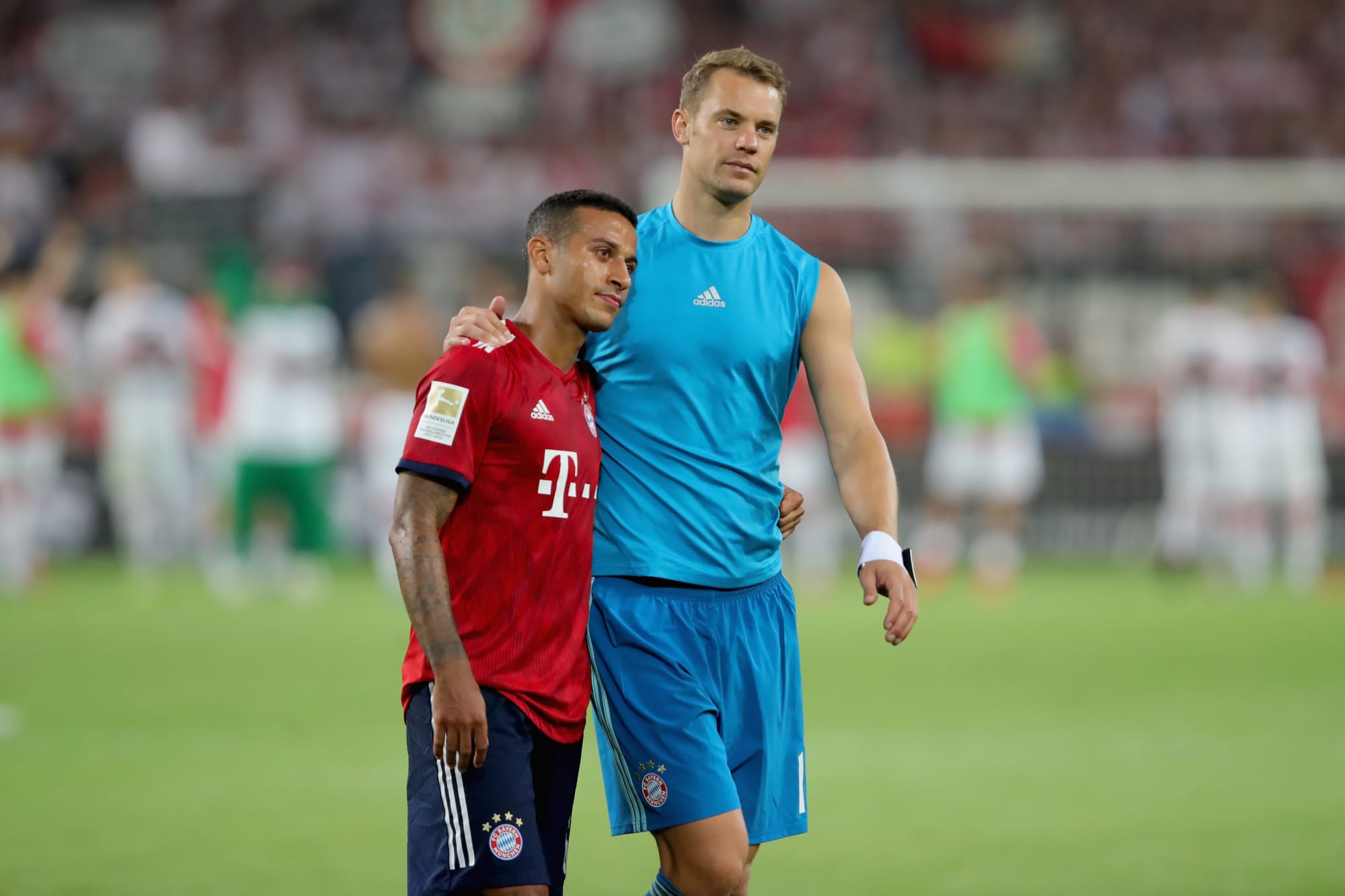  Two Bayern Munich players console each other after losing the 2018 DFB Cup final.