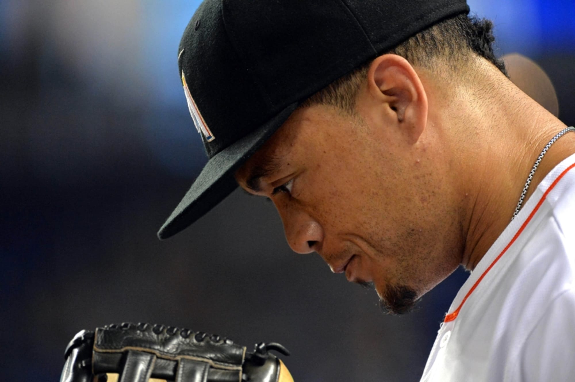 Marlins' Giancarlo Stanton hit in face by pitch, taken off field on