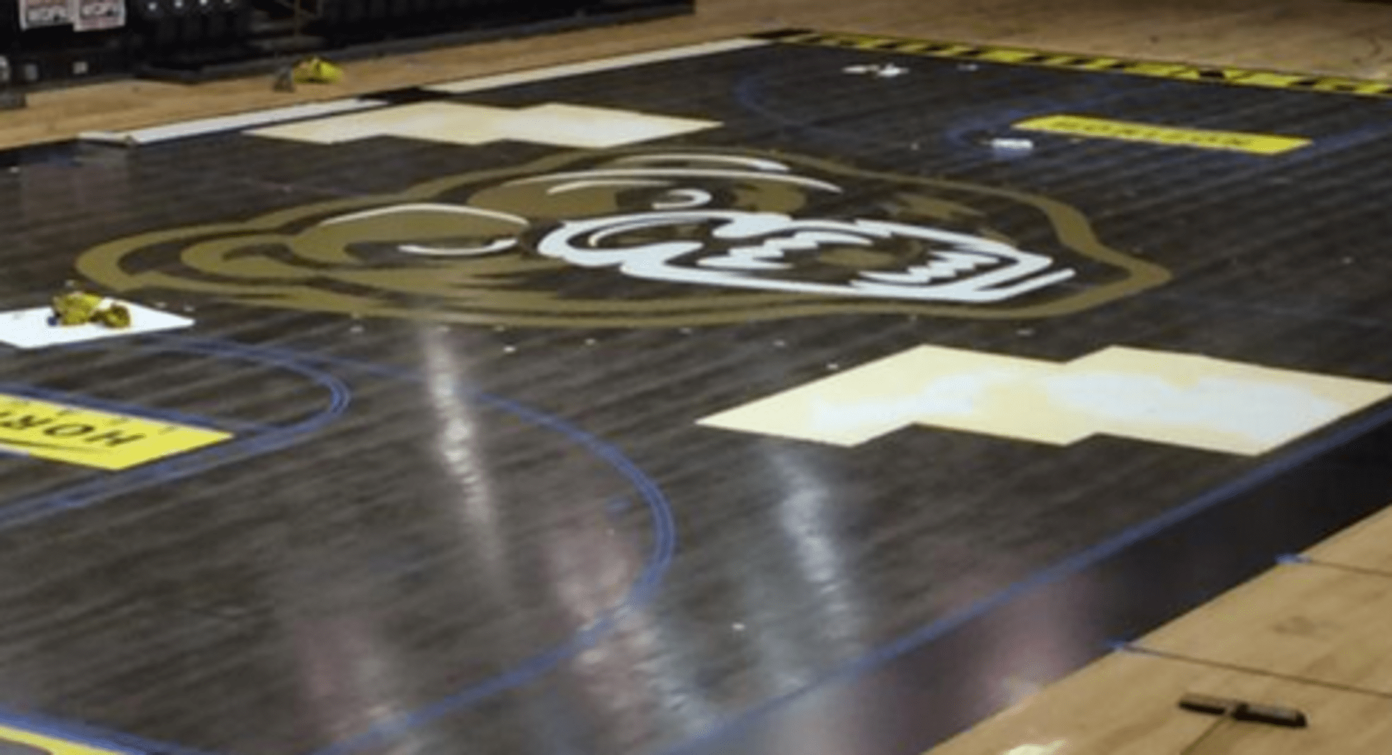 Oakland University paints new basketball court like black top