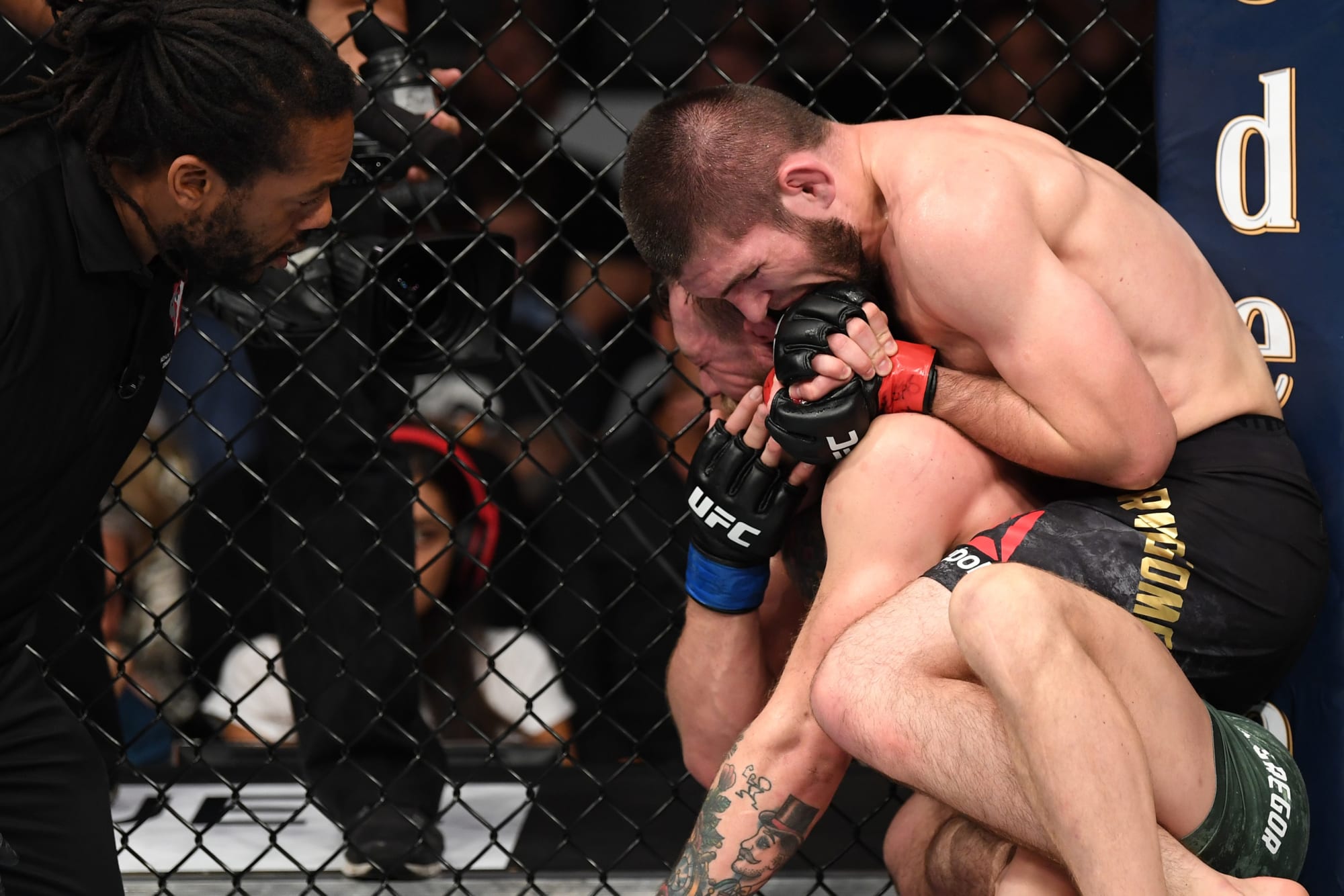 UFC 229 Khabib Nurmagomedov chokes Conor McGregor, initiates a riot