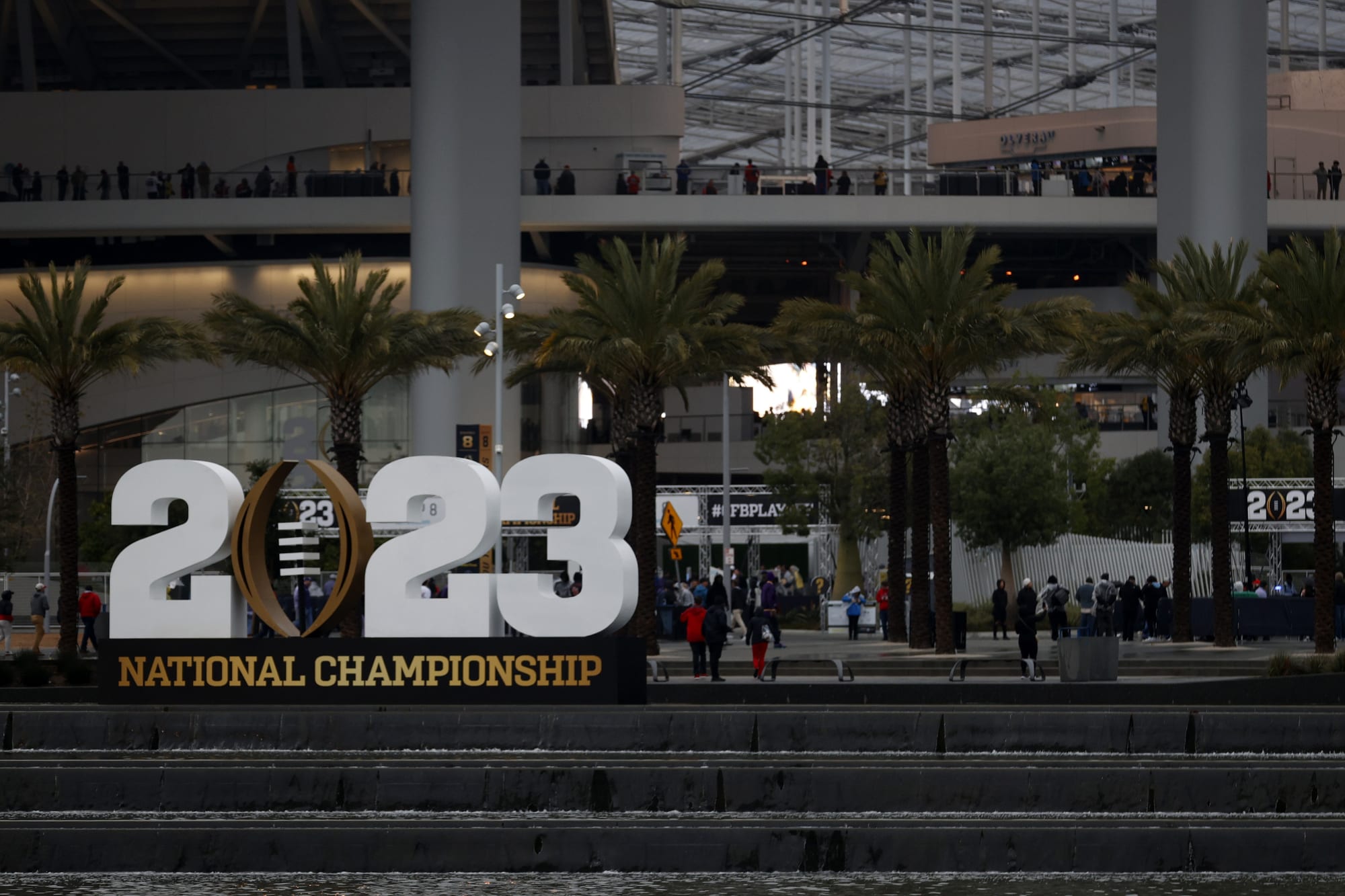 When does College Football Playoff expansion go into effect?