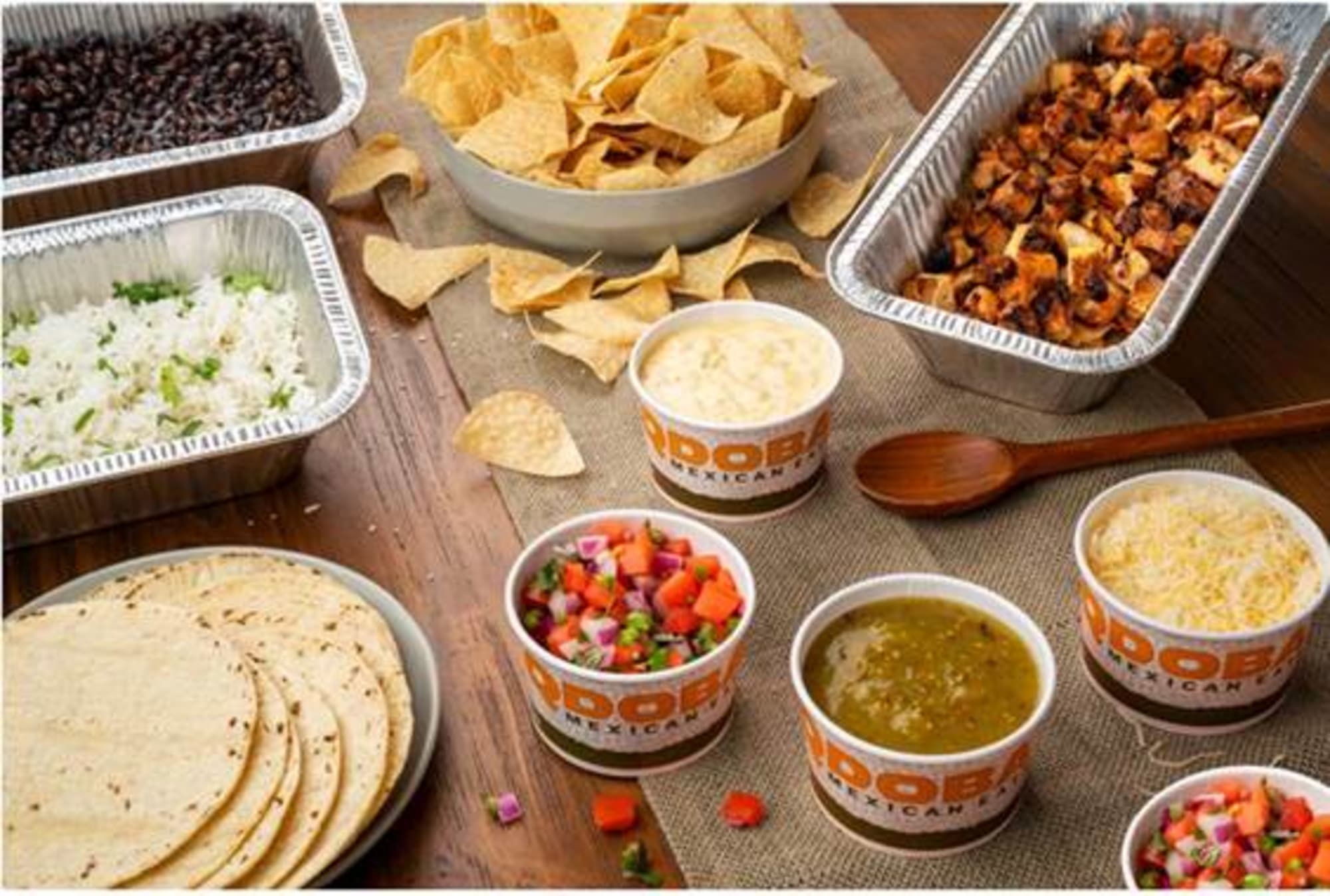 QDOBA is teaming with Cholula to bring us some sweet heat