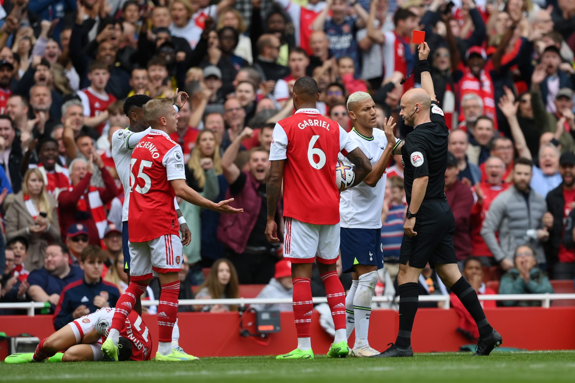 Taylor takes derby out of Tottenham hands, as Arsenal stay top