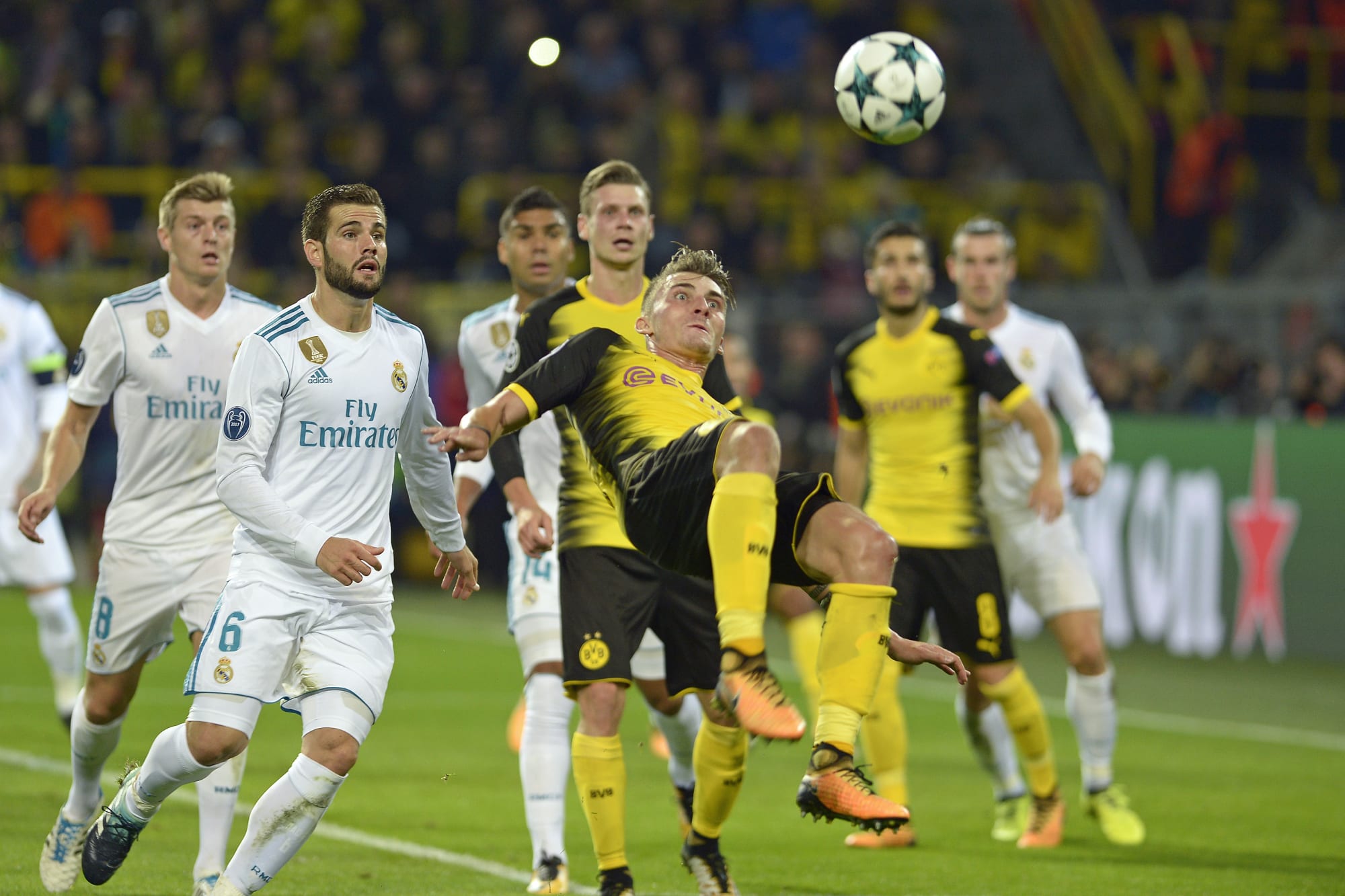  Real Madrid and Borussia Dortmund players compete for the ball during the 2017/18 Champions League Final at Wembley Stadium.