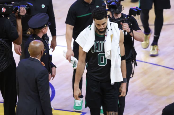 Jayson Tatum of the Boston Celtics walks off the court after the