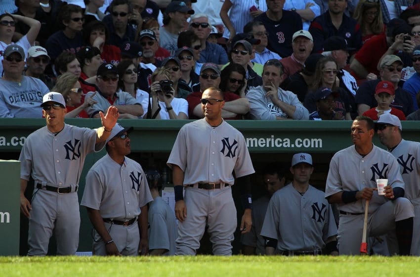 BOSTON, MA - APRIL 20: Derek Jeter #2 of the New York Yankees watches from the bench during a game against the Boston Red Sox at Fenway Park April 20, 2012 in Boston, Massachusetts. (Photo by J. Rogash/Getty Images)