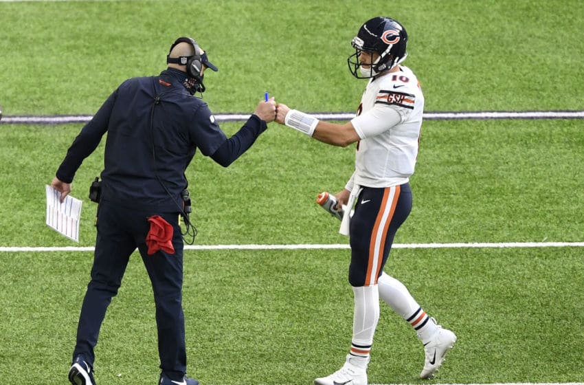 MINNEAPOLIS, MINNESOTA - DECEMBER 20: Head coach Matt Nagy of the Chicago Bears fist bumps Mitchell Trubisky #10 during the first half against the Minnesota Vikings at U.S. Bank Stadium on December 20, 2020 in Minneapolis, Minnesota. (Photo by Hannah Foslien/Getty Images)