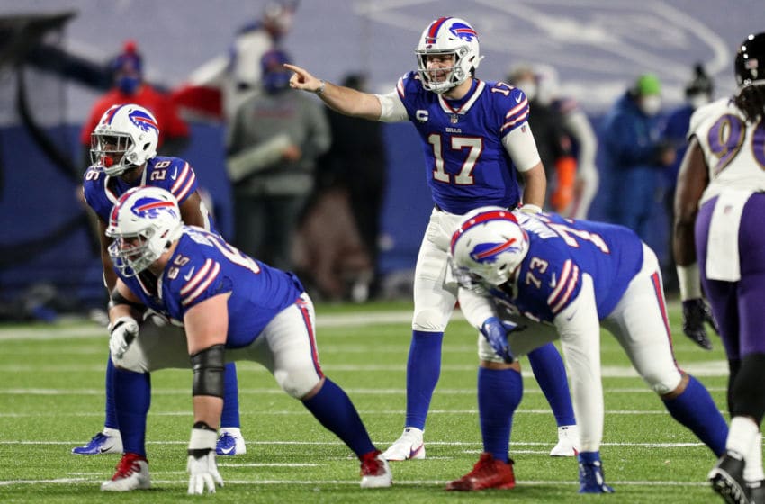 ORCHARD PARK, NEW YORK - JANUARY 16: Josh Allen #17 of the Buffalo Bills signals before the snap in the first quarter against the Baltimore Ravens during the AFC Divisional Playoff game at Bills Stadium on January 16, 2021 in Orchard Park, New York. (Photo by Bryan M. Bennett/Getty Images)