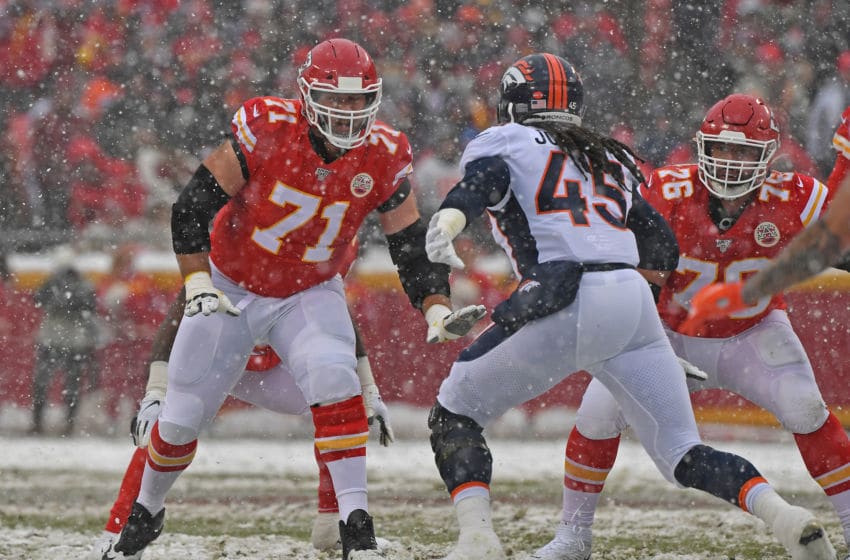 KANSAS CITY, MO - DECEMBER 15: Offensive tackle Mitchell Schwartz #71 of the Kansas City Chiefs gets set to block linebacker A.J. Johnson #45 of the Denver Broncos during the first half at Arrowhead Stadium on December 15, 2019 in Kansas City, Missouri. (Photo by Peter G. Aiken/Getty Images)